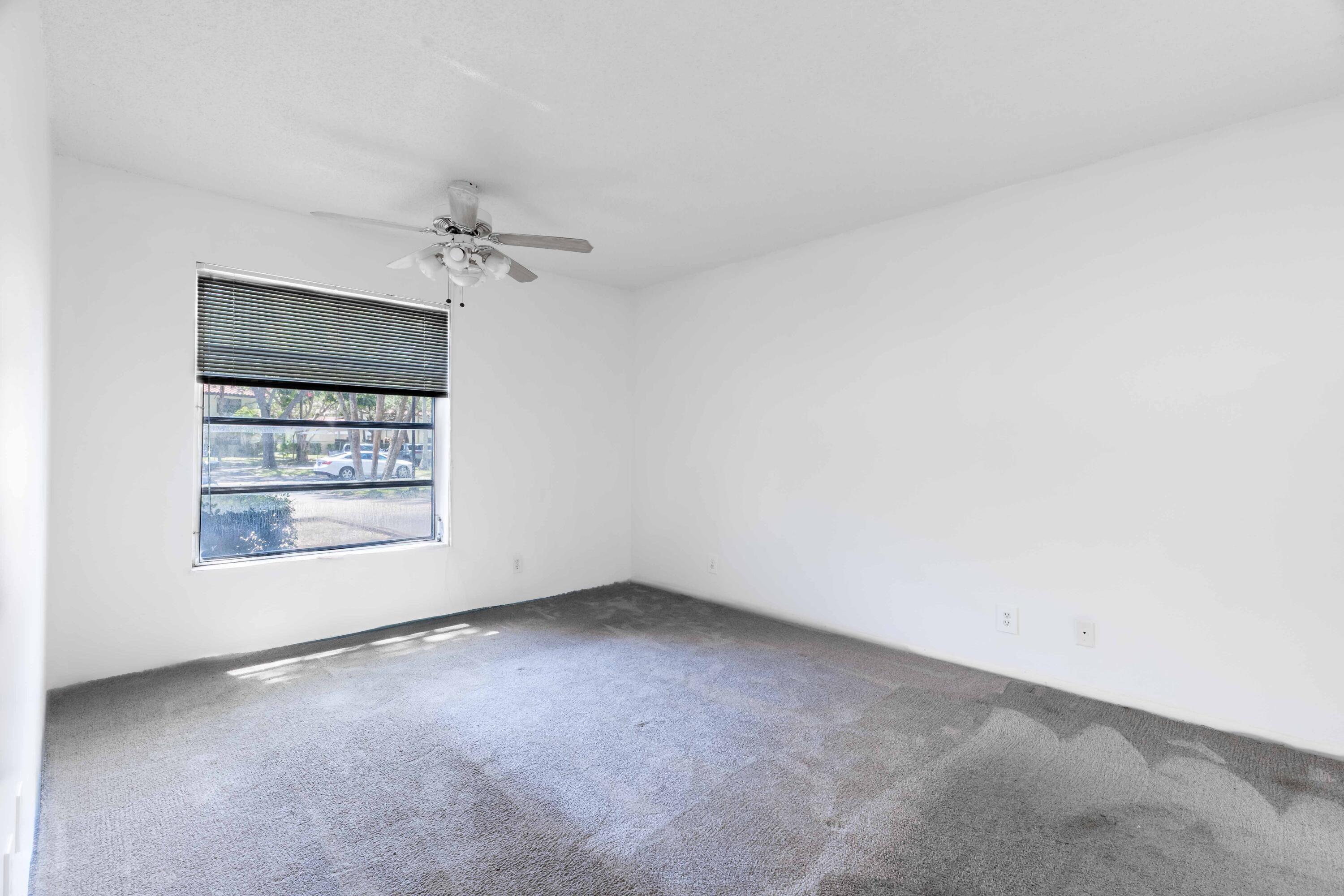 490 Northwest 20th Street, Unit 1050 Boca Raton, FL 33431 - Photo 13 of 23 Primary Bedroom