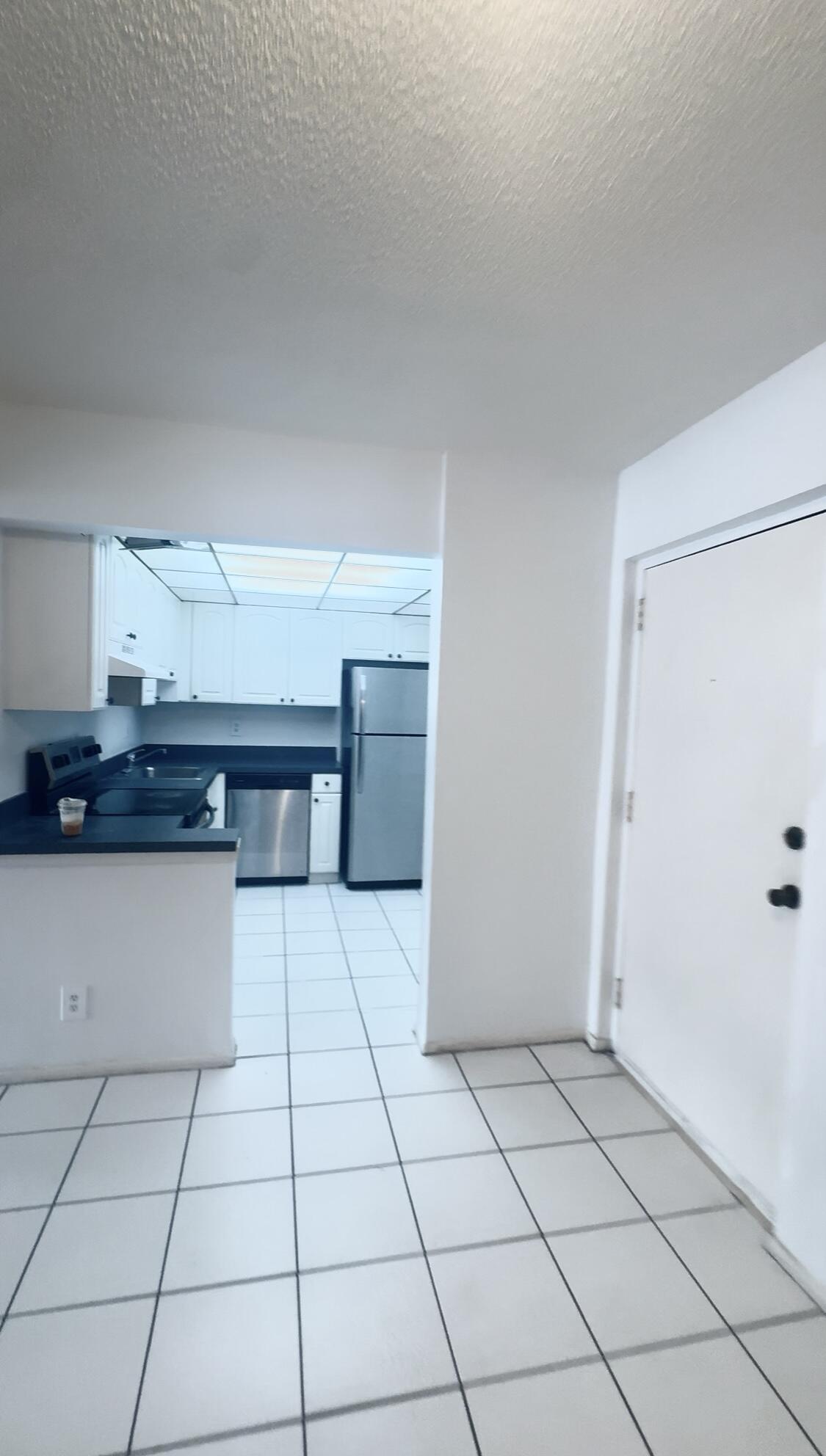 490 Northwest 20th Street, Unit 1050 Boca Raton, FL 33431 - Photo 20 of 23 Front Door