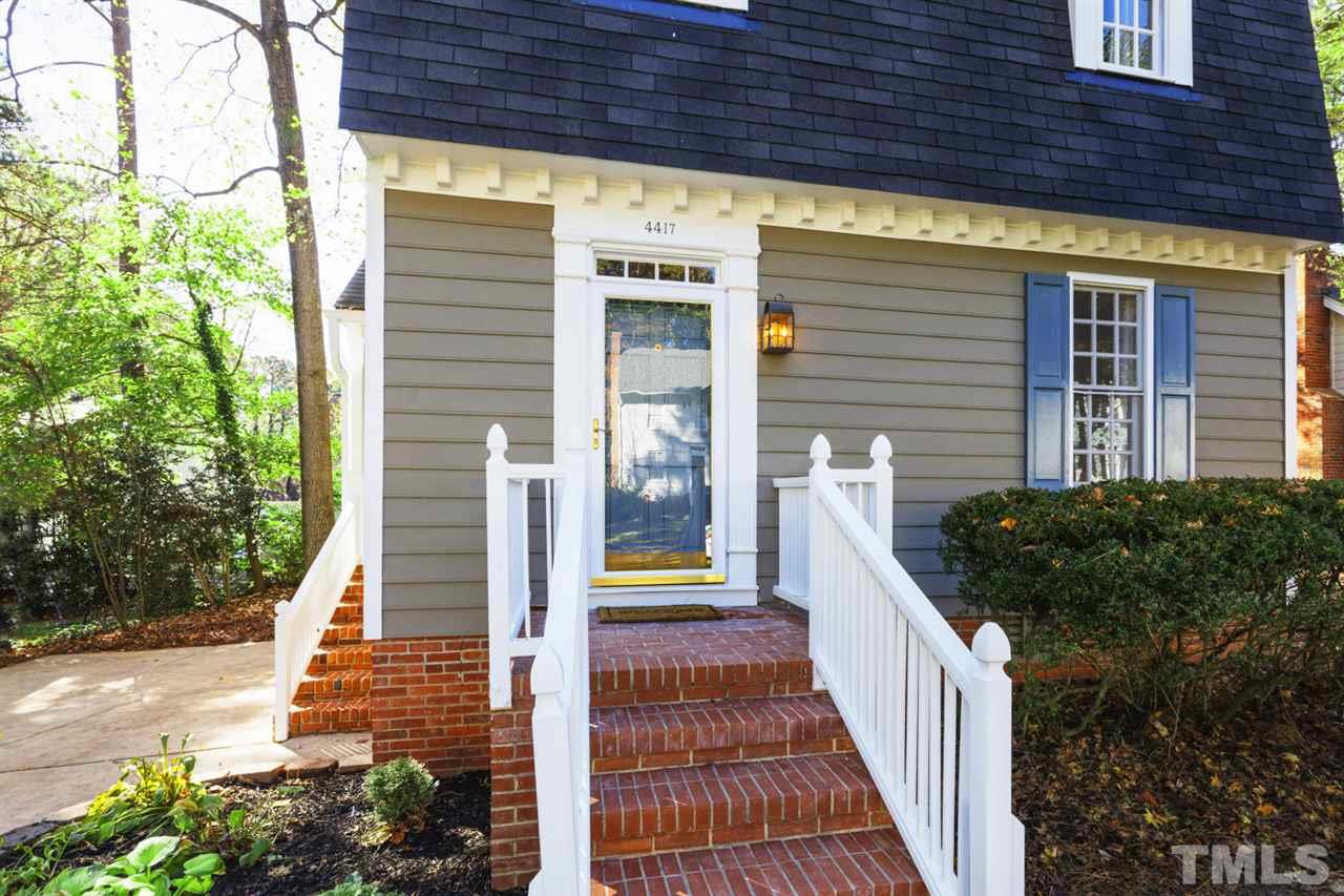 4417 Lancashire Drive Raleigh, NC 27613 - Photo 2 of 30 a view of a pathway both side of building