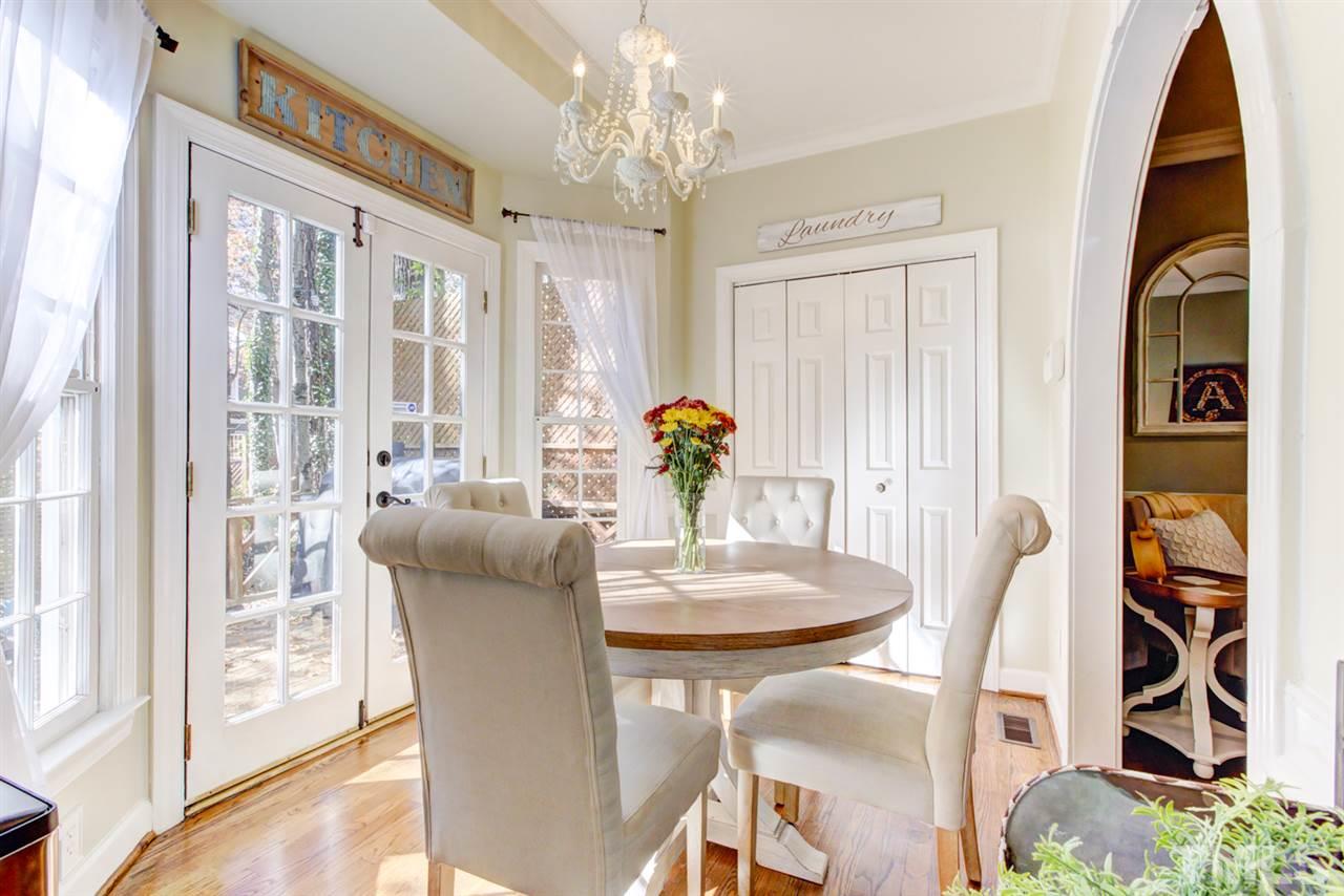 4417 Lancashire Drive Raleigh, NC 27613 - Photo 6 of 30 a dining room with furniture and window