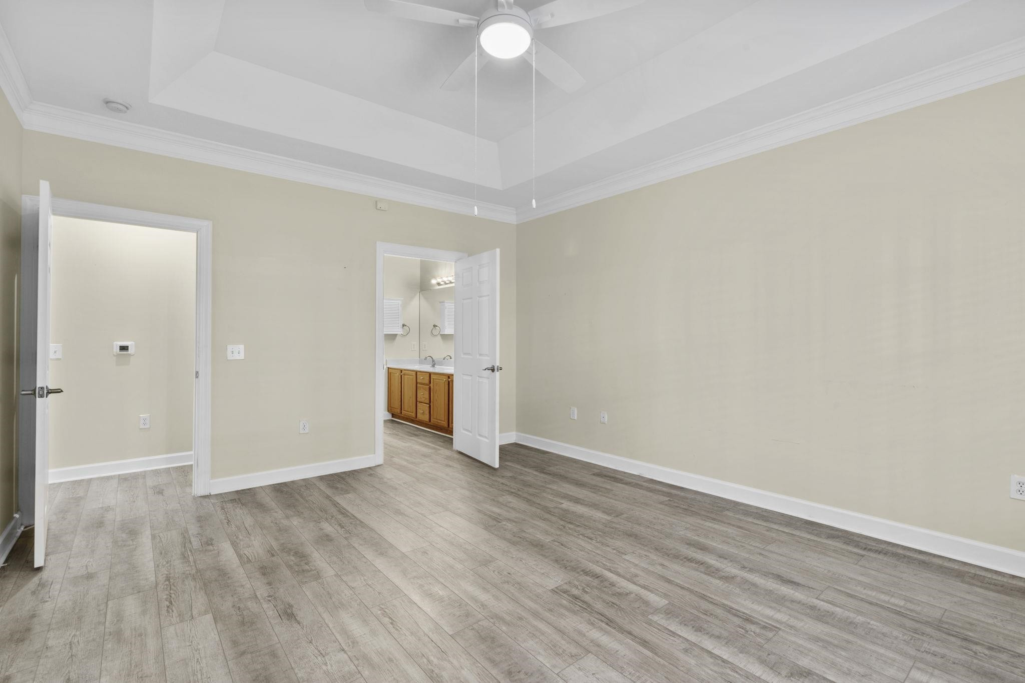 603 Rigside Place, Unit C Cary, NC 27511 - Photo 20 of 30 Master Suite with Walk-In Wardrobe
