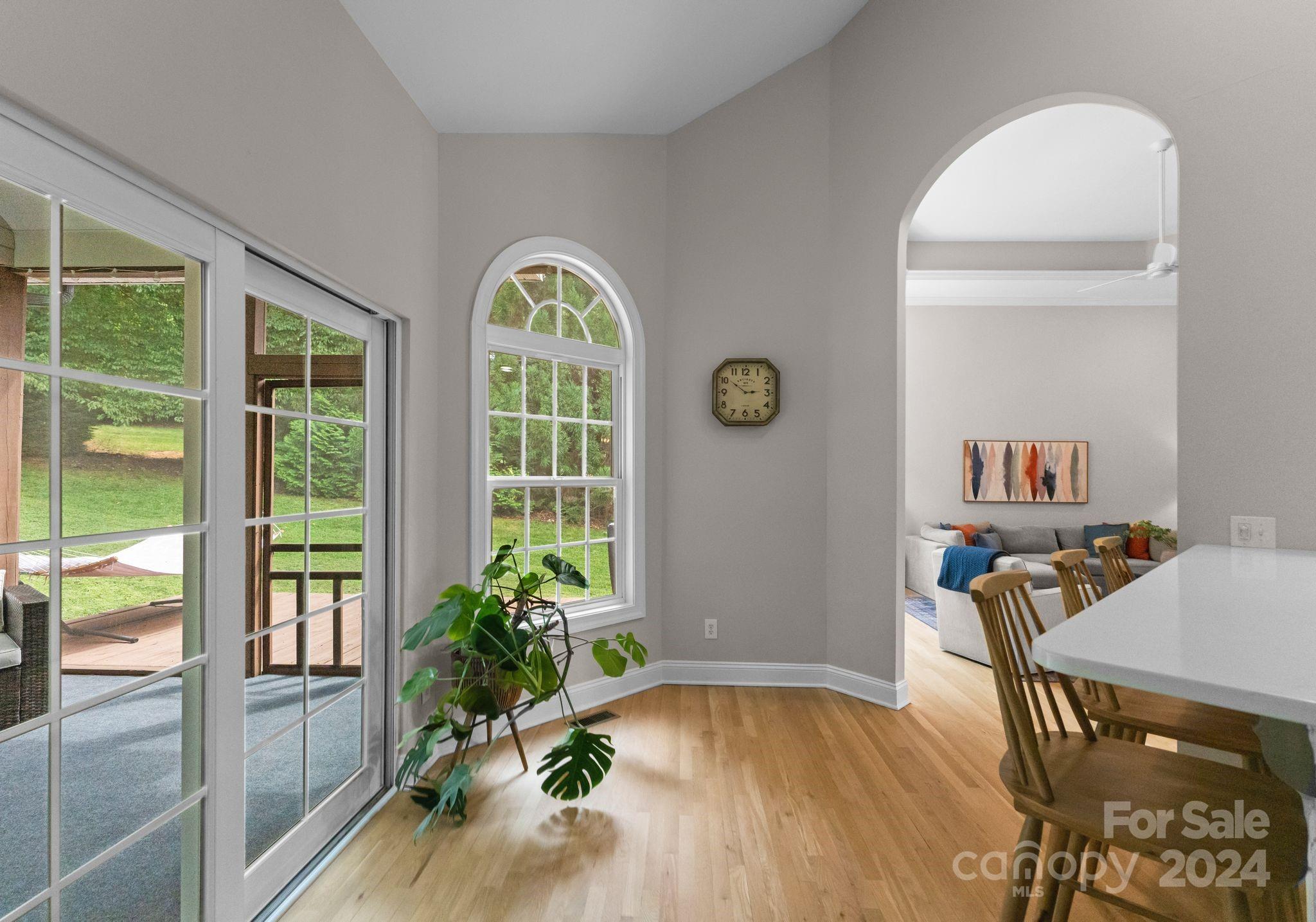 687 Normandy Road Mooresville, NC 28117 - Photo 22 of 32 a view of a dining room with furniture window and wooden floor