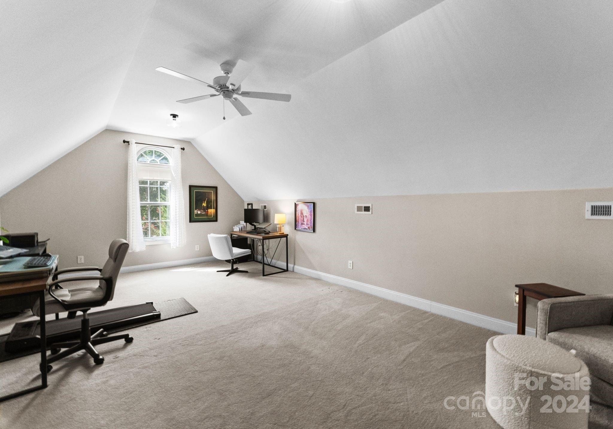 687 Normandy Road Mooresville, NC 28117 - Photo 30 of 32 a view of a livingroom with workspace and a window