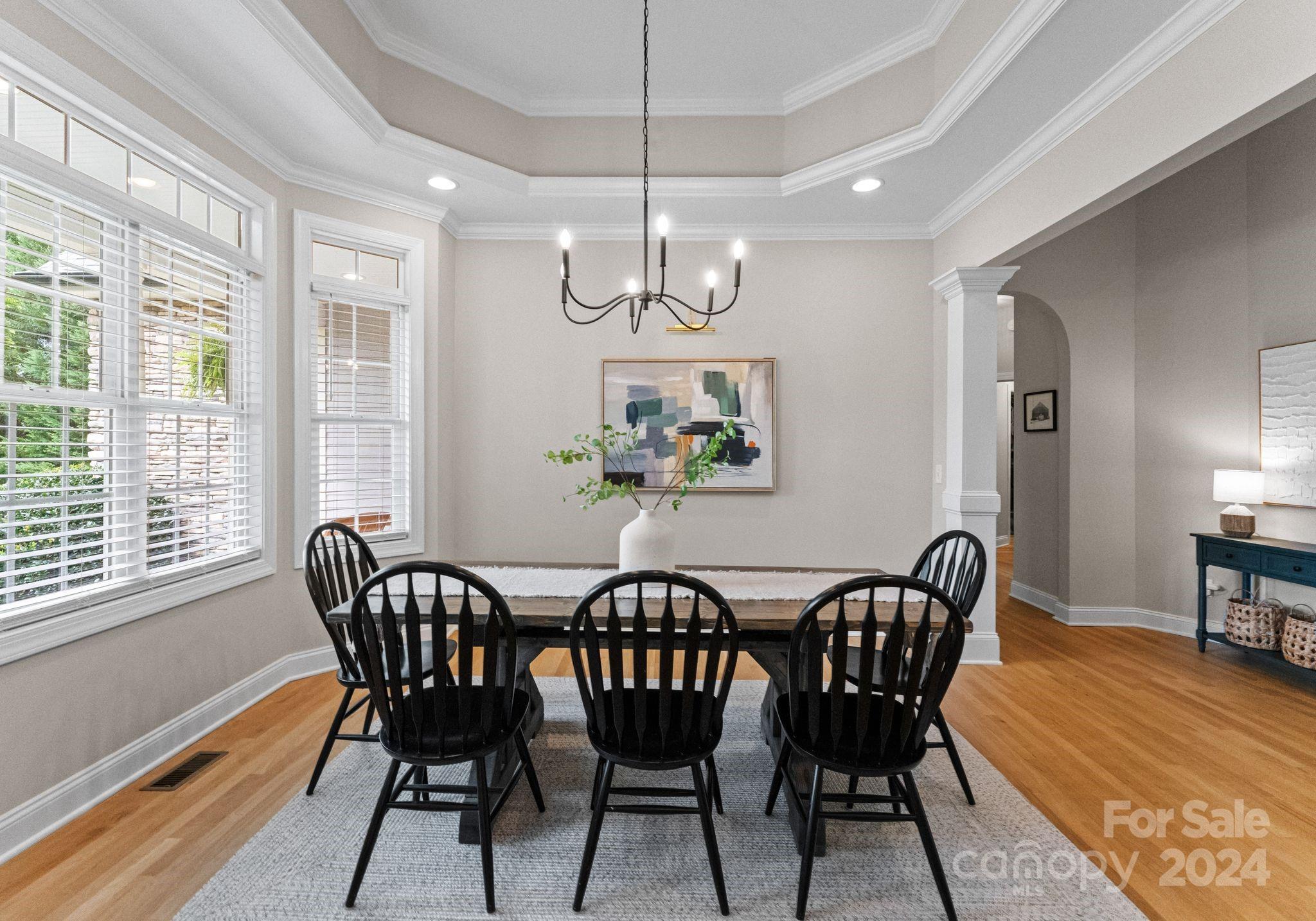 687 Normandy Road Mooresville, NC 28117 - Photo 10 of 32 a view of a dining room with furniture window and wooden floor