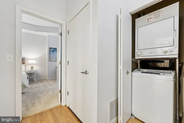a view of a bathroom from a hallway