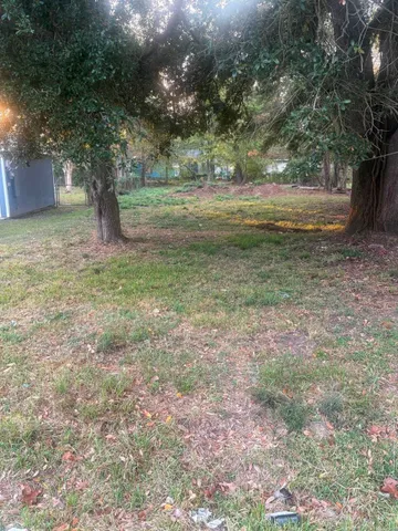 a fire hydrant in the middle of a field