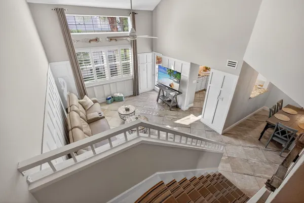 a view of a livingroom with furniture and a flat screen tv