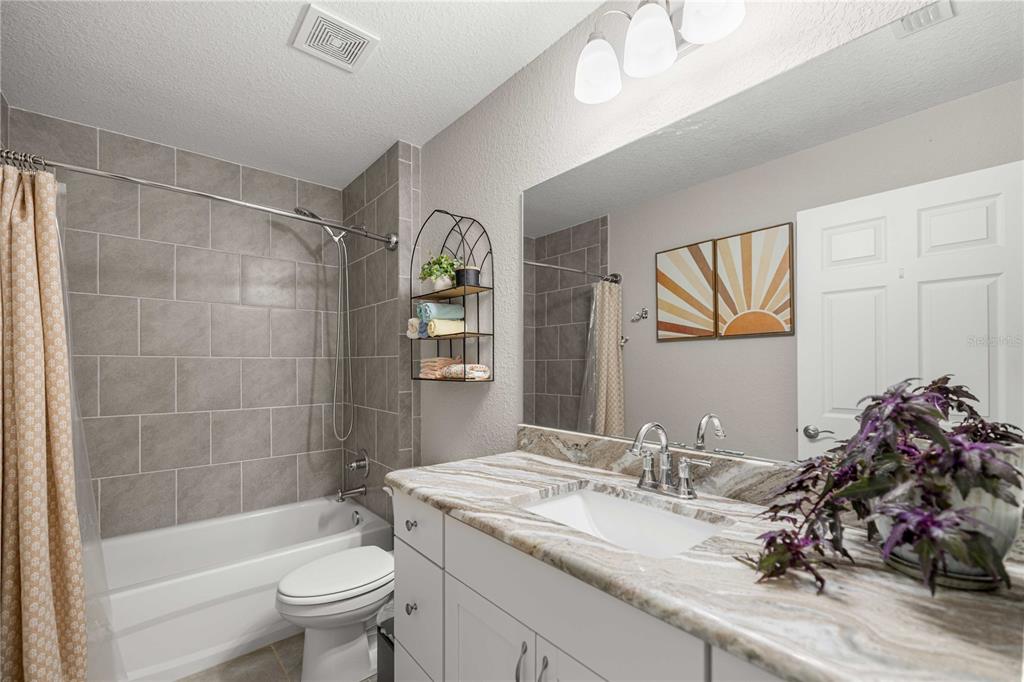 279 Southwest Fig Tree Lane Dunnellon, FL 34431 - Photo 21 of 33 a bathroom with a sink toilet and shower
