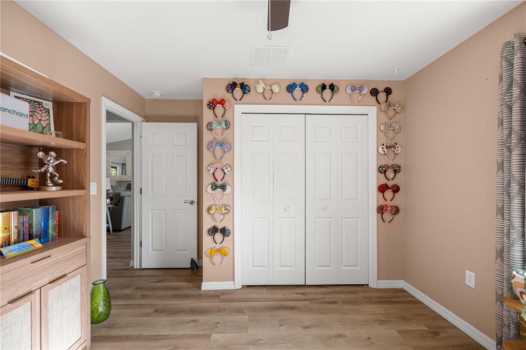 279 Southwest Fig Tree Lane Dunnellon, FL 34431 - Photo 23 of 33 a view of walk in closet with clothes and shoes