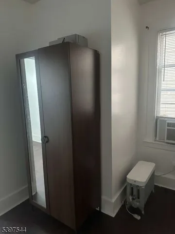 a view of bathroom with a toilet and a sink