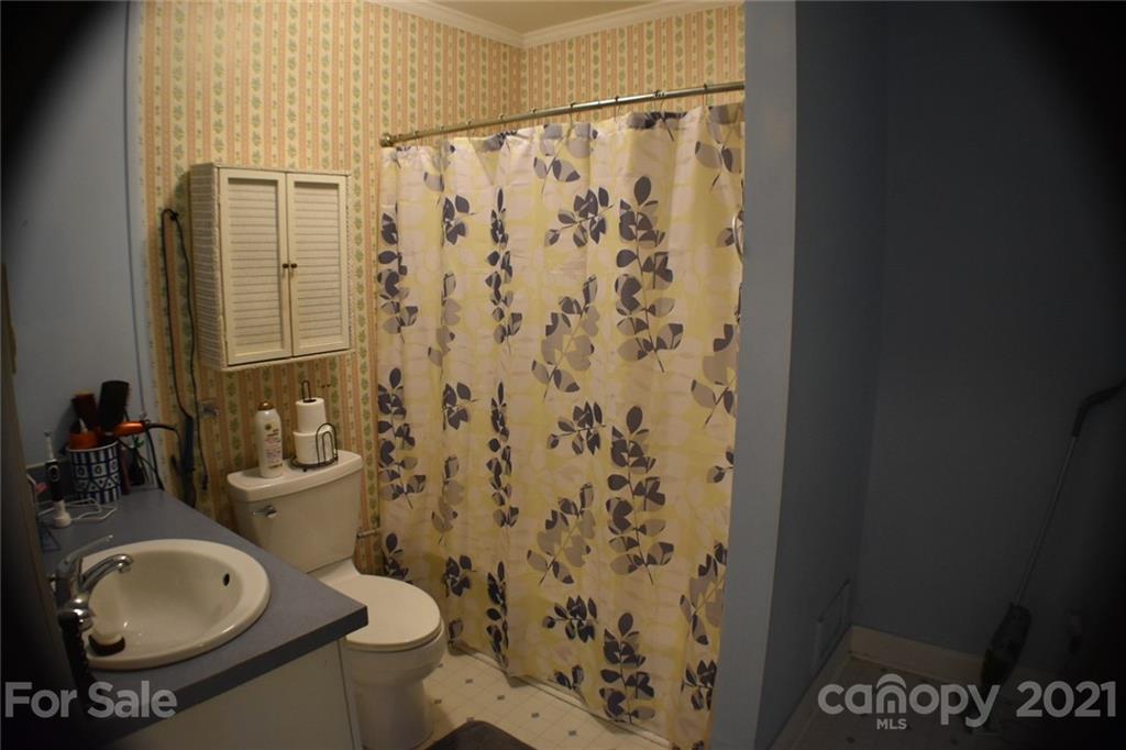 3670 Union Road Gastonia, NC 28056 - Photo 23 of 41 a bathroom with a sink toilet and shower