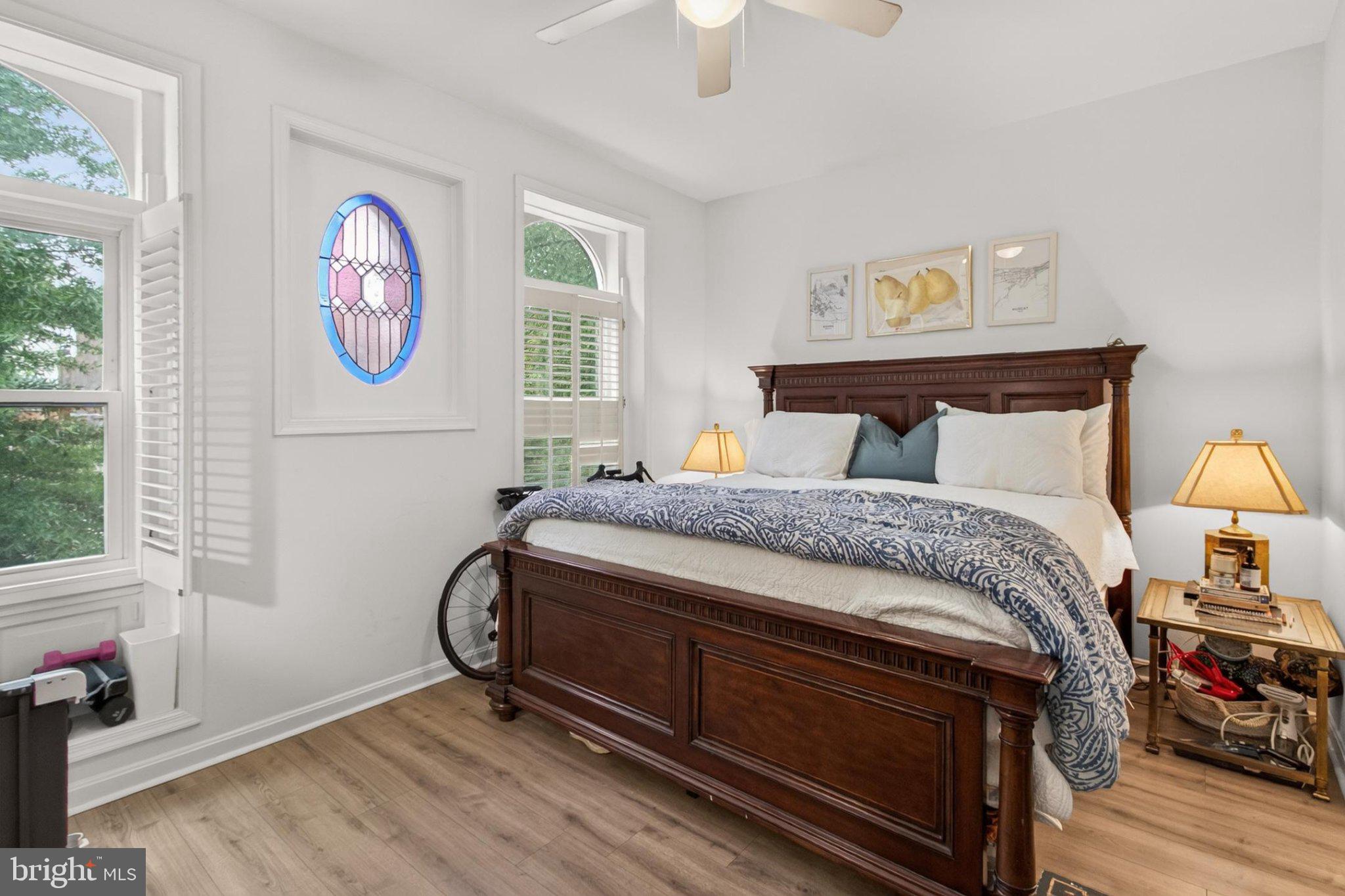738 11th Street Northeast, Unit 1 Washington, DC 20002 - Photo 17 of 21 Charming bedroom with stained glass accents.