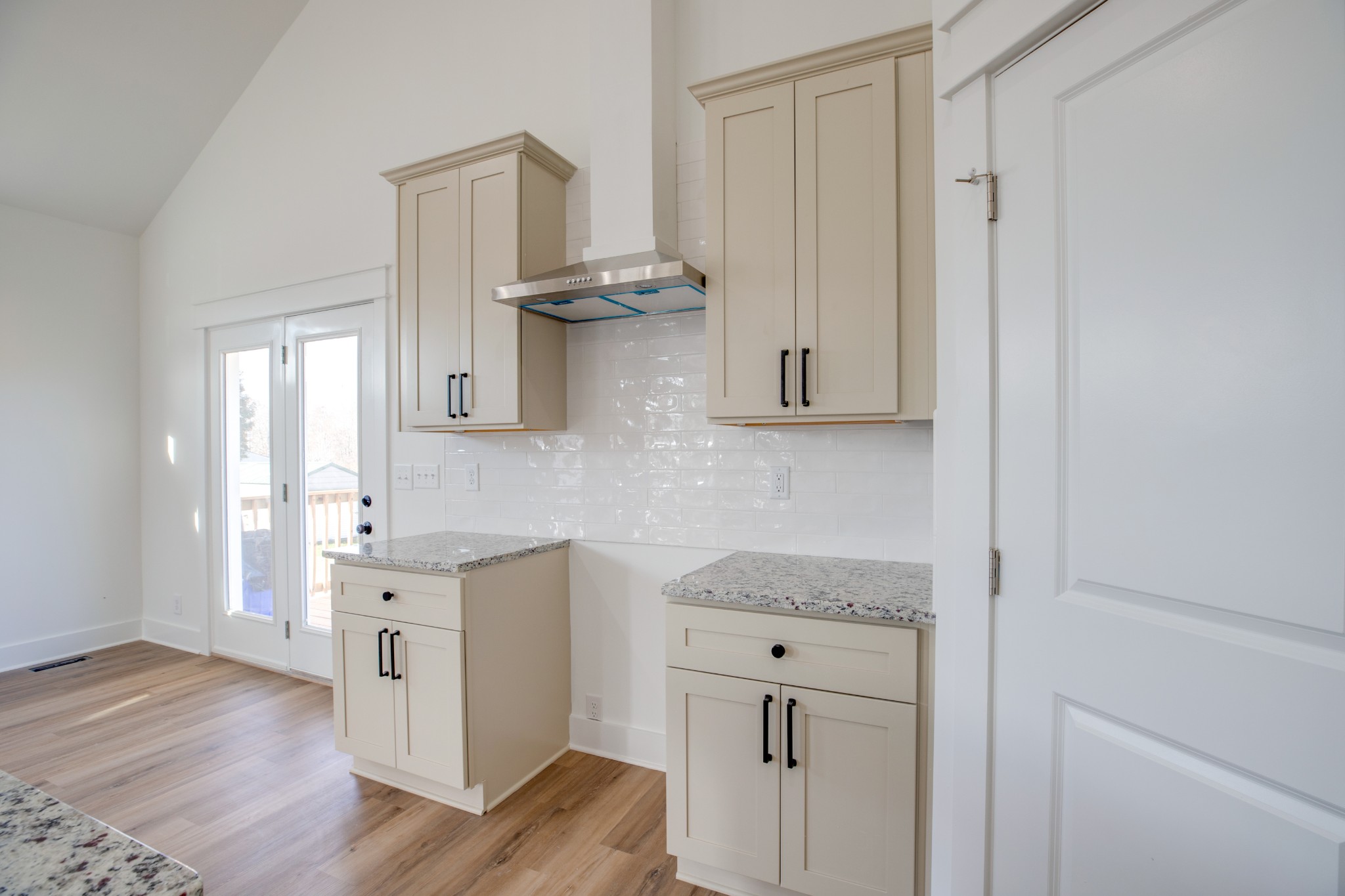 2802 Lock Hollow Road Dickson, TN 37055 - Photo 16 of 34 a kitchen with stainless steel appliances granite countertop a sink and wooden cabinets