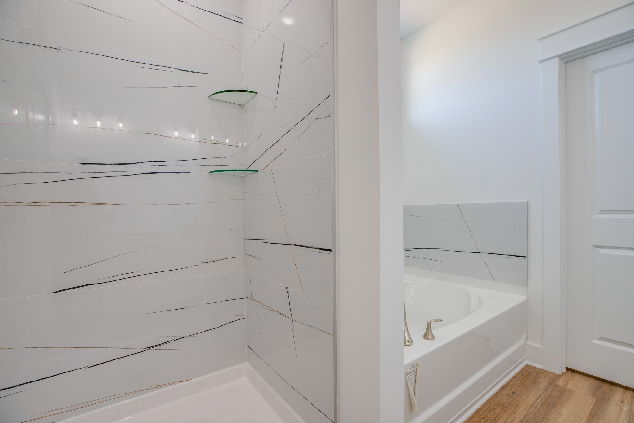 2802 Lock Hollow Road Dickson, TN 37055 - Photo 23 of 34 a bathroom with a bathtub and shower