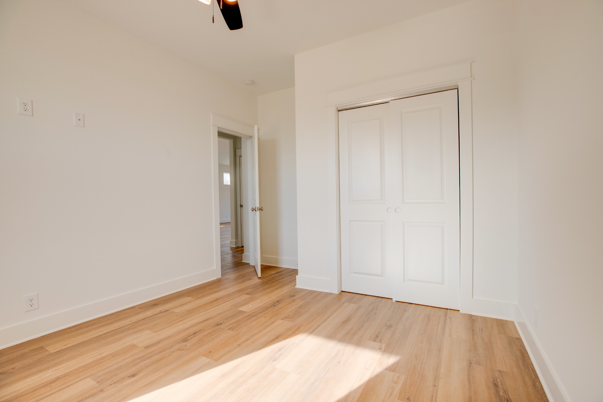 2802 Lock Hollow Road Dickson, TN 37055 - Photo 26 of 34 an empty room with wooden floor and windows