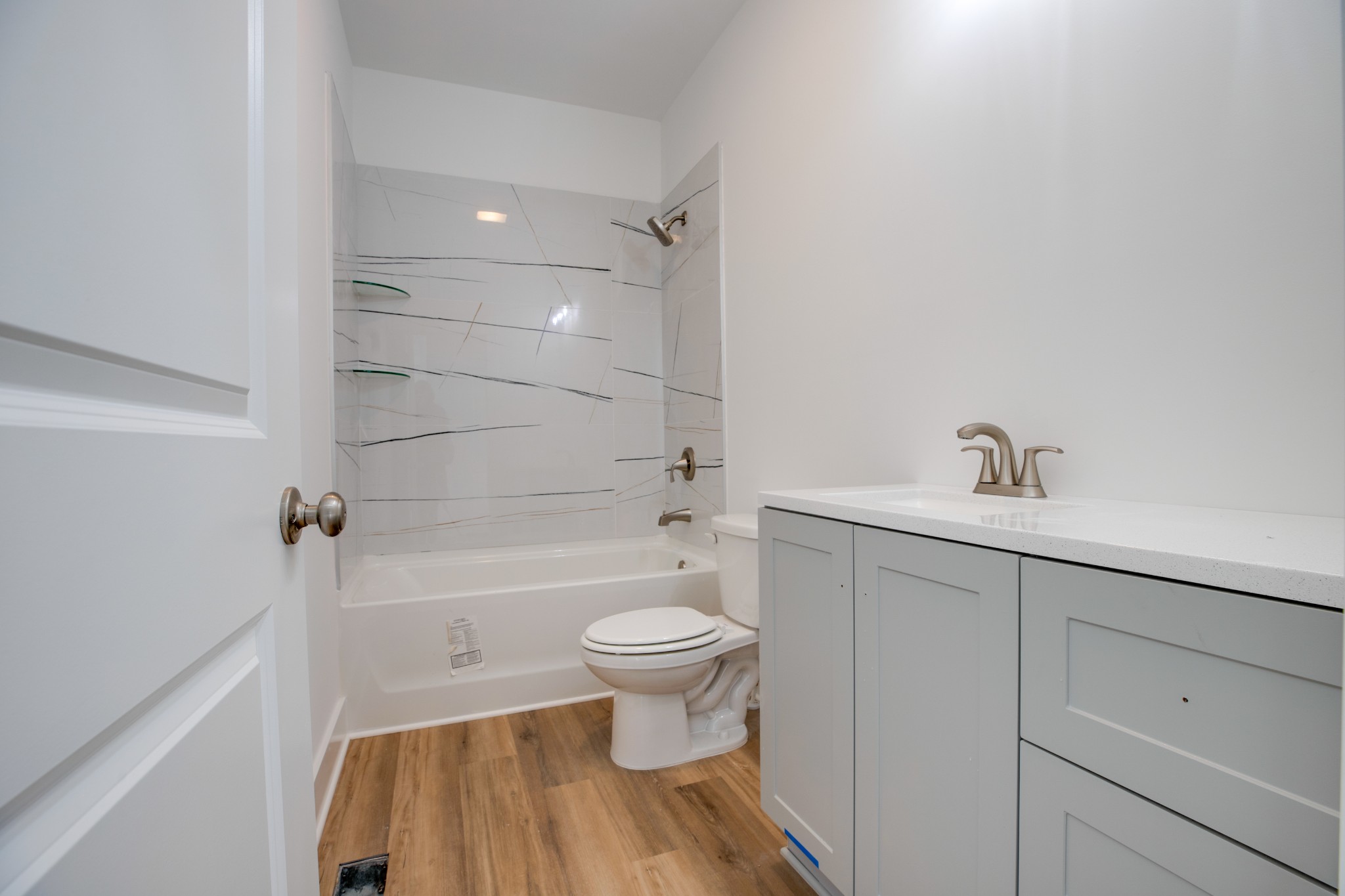 2802 Lock Hollow Road Dickson, TN 37055 - Photo 27 of 34 a bathroom with a sink toilet and shower