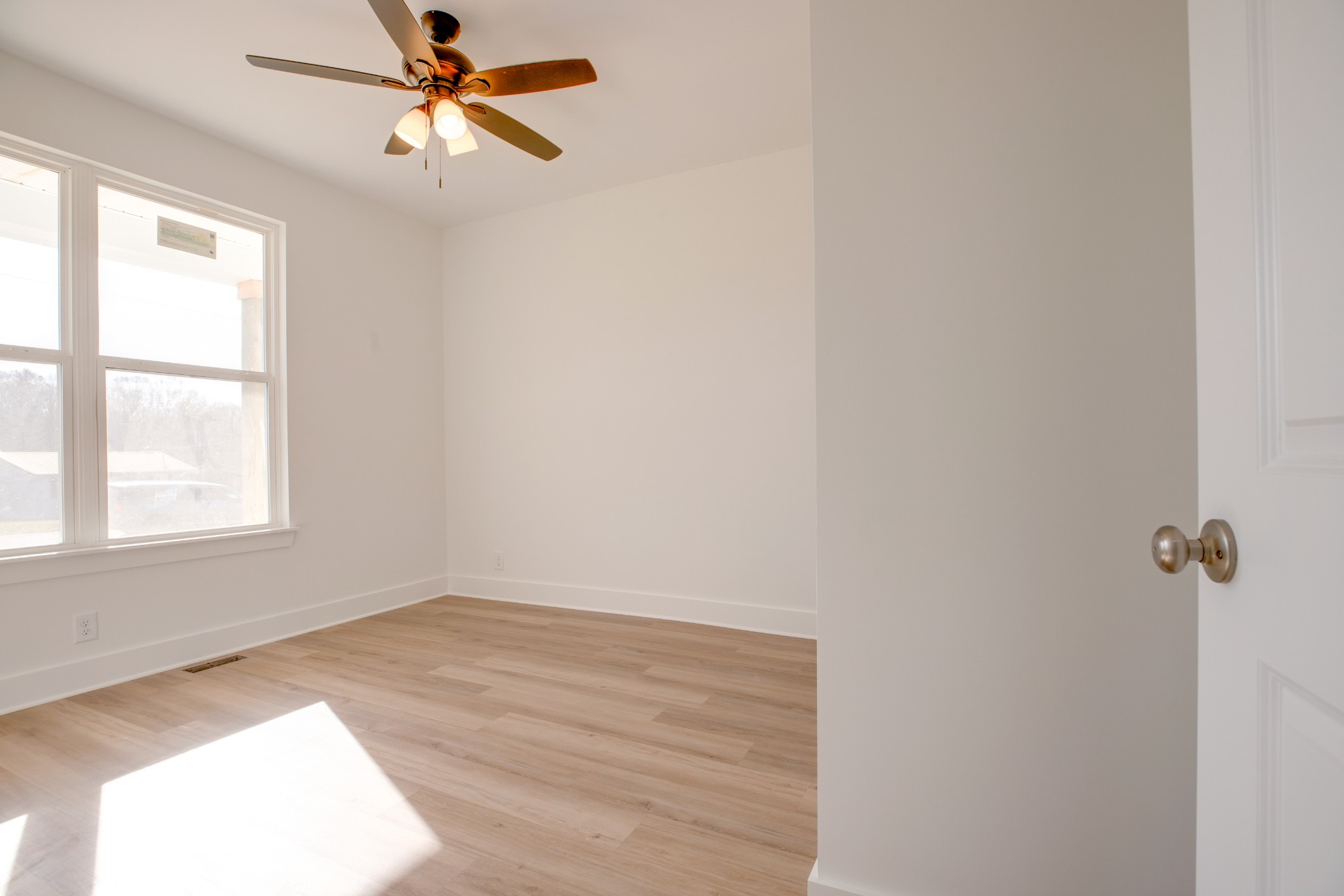 2802 Lock Hollow Road Dickson, TN 37055 - Photo 28 of 34 a view of a room with a window and a ceiling fan