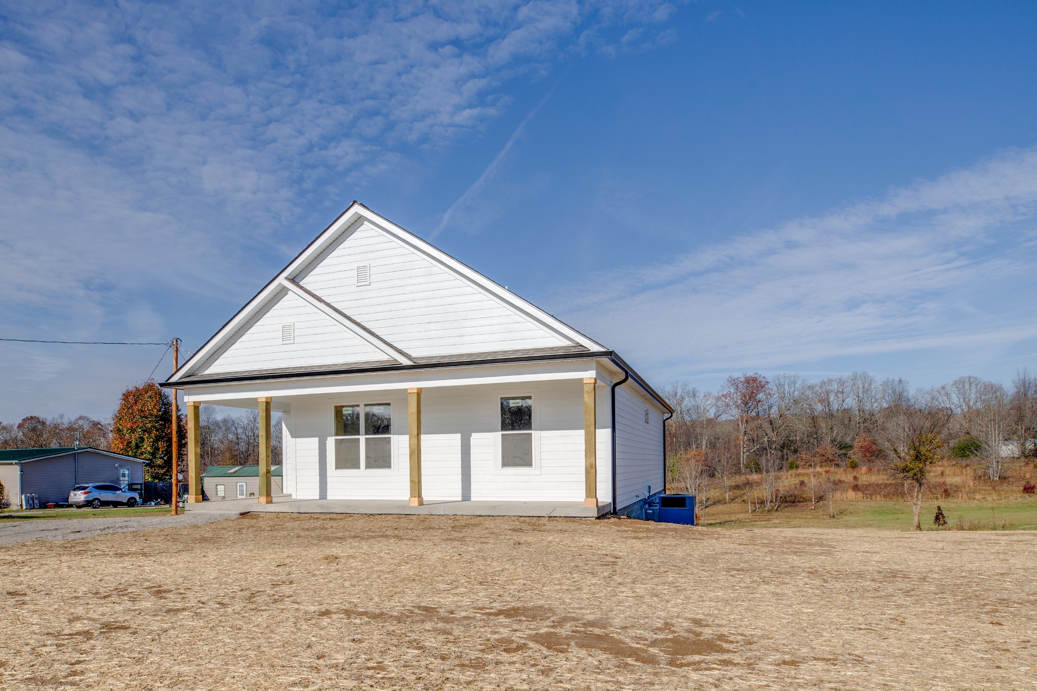 2802 Lock Hollow Road Dickson, TN 37055 - Photo 3 of 34 a front view of a house with a yard