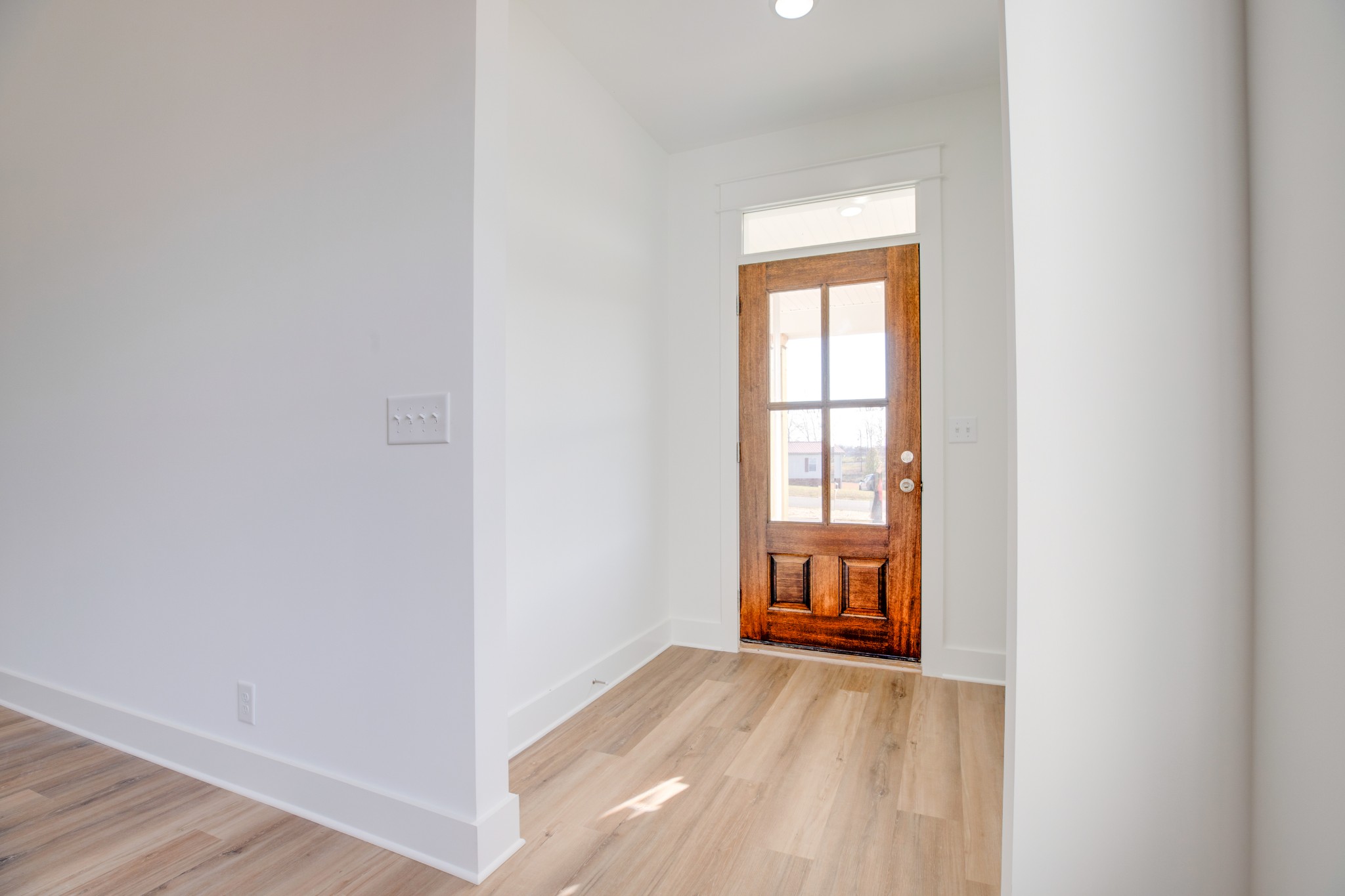 2802 Lock Hollow Road Dickson, TN 37055 - Photo 6 of 34 a view of an empty room with wooden floor and a window