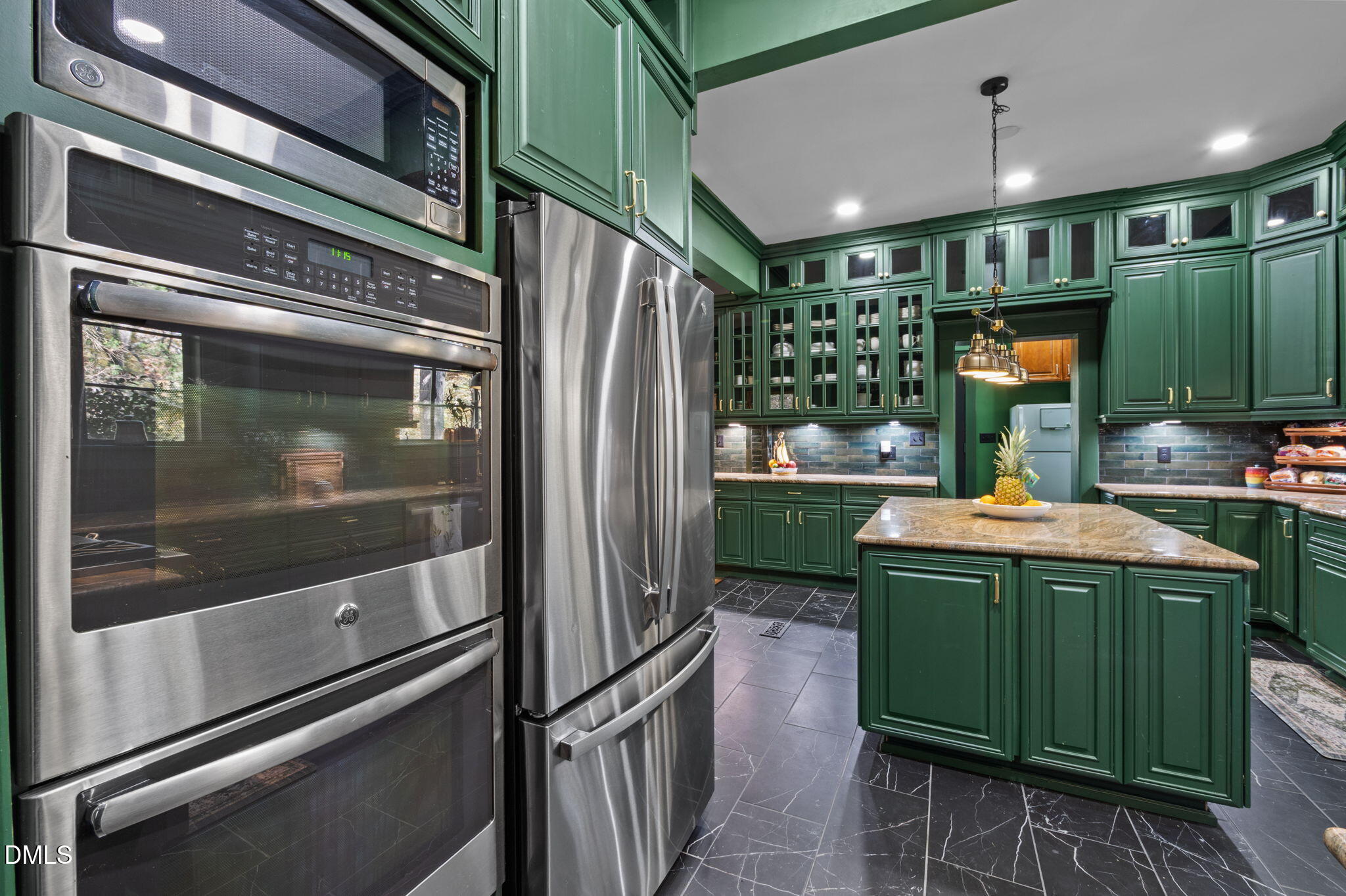 7891 Boston Road Roxboro, NC 27574 - Photo 26 of 85 a kitchen with a refrigerator and a sink