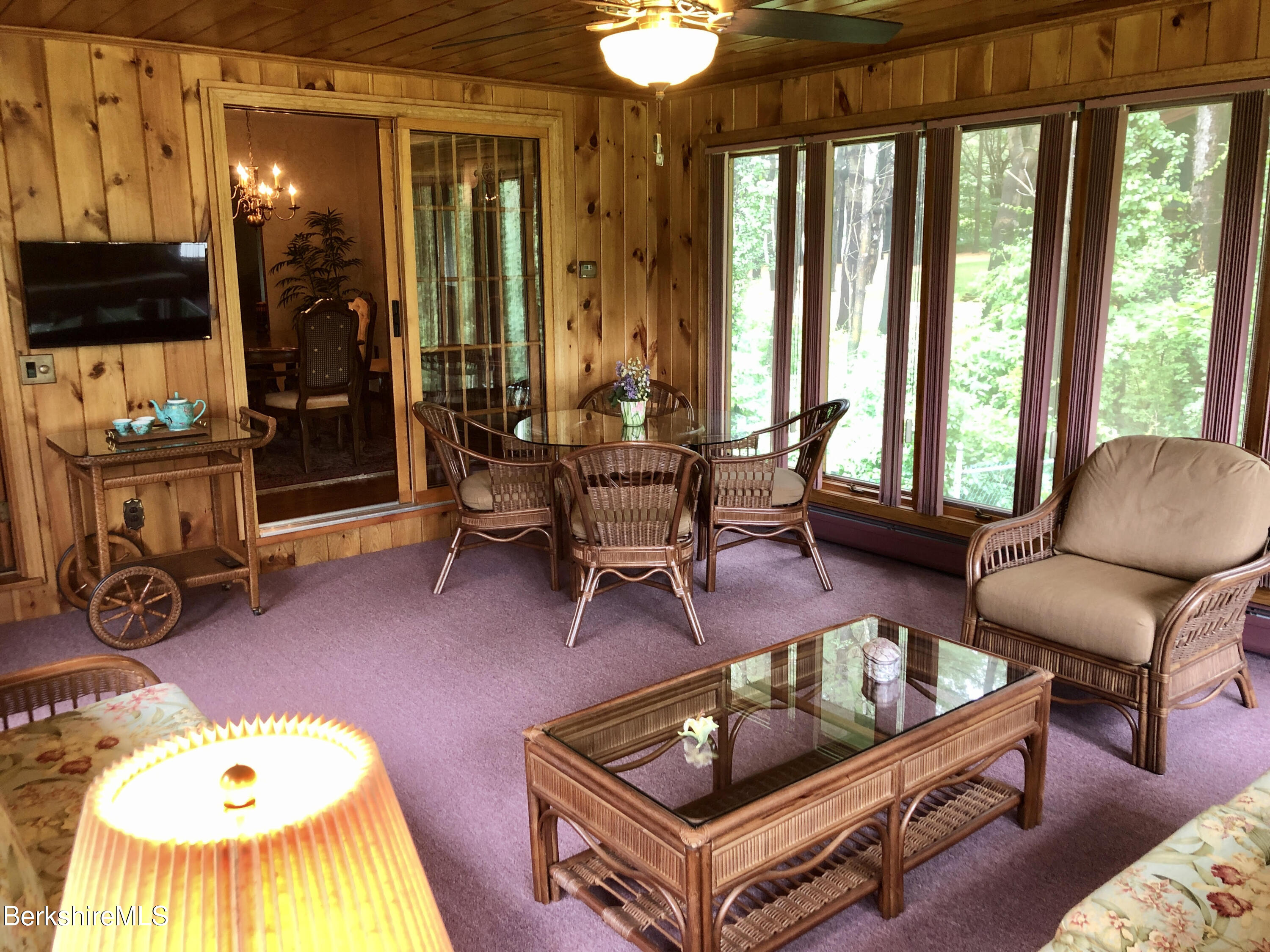 35 Pine Knoll Road Lenox, MA 01240 - Photo 11 of 26 a living room with furniture and a large window