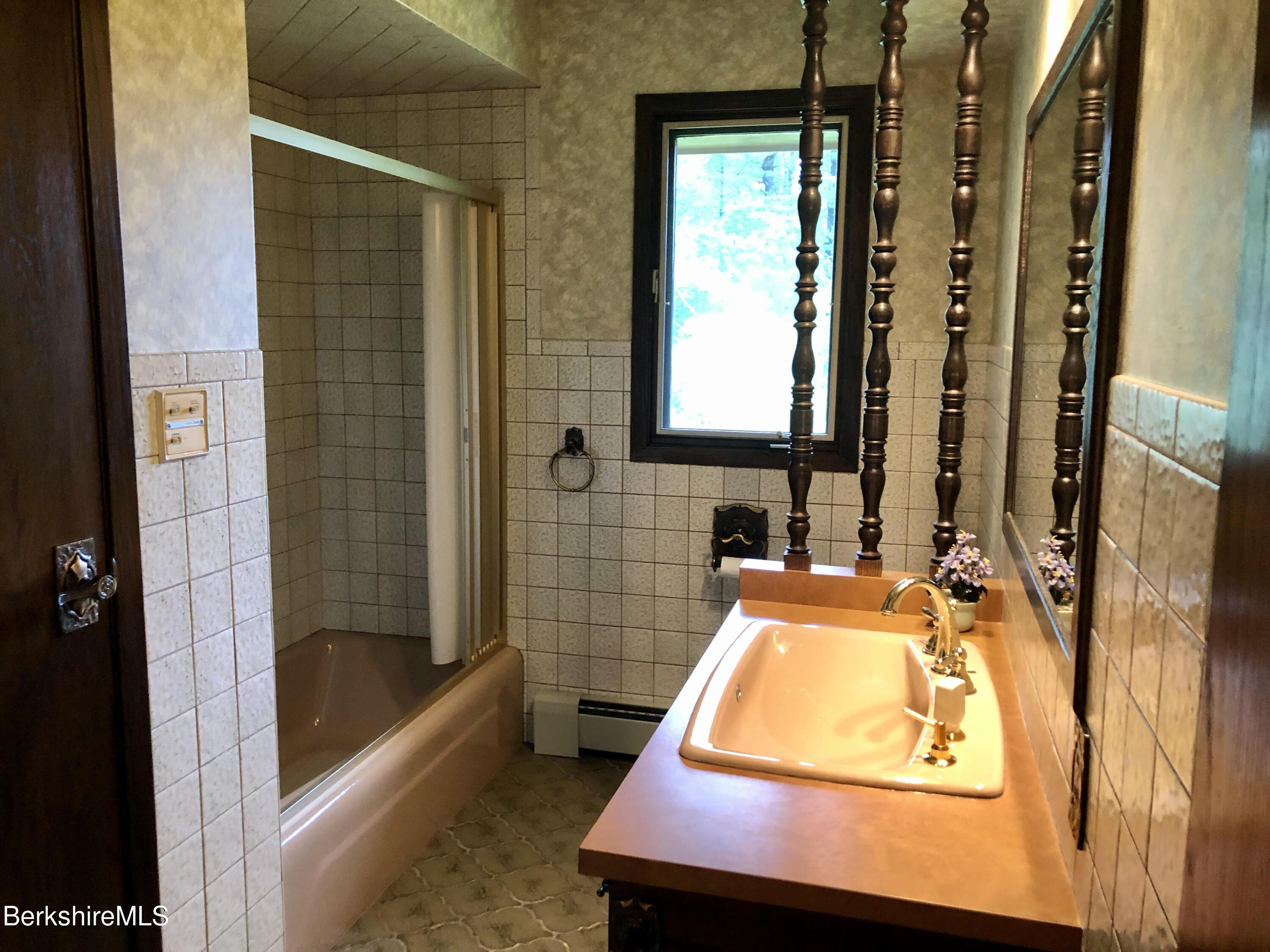 35 Pine Knoll Road Lenox, MA 01240 - Photo 14 of 26 a bathroom with a sink and a bathtub