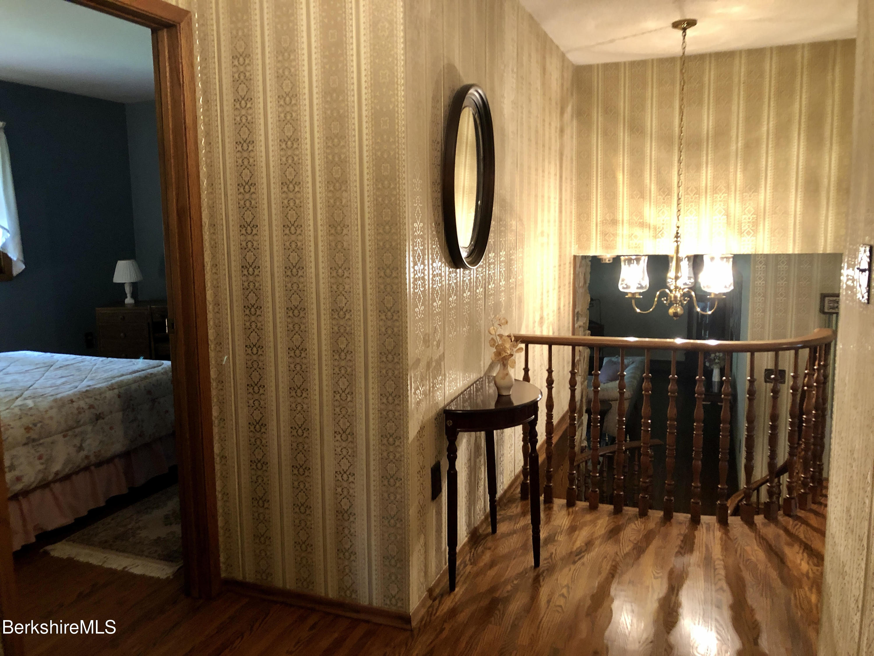 35 Pine Knoll Road Lenox, MA 01240 - Photo 15 of 26 a view of a bathroom with a shower and a mirror