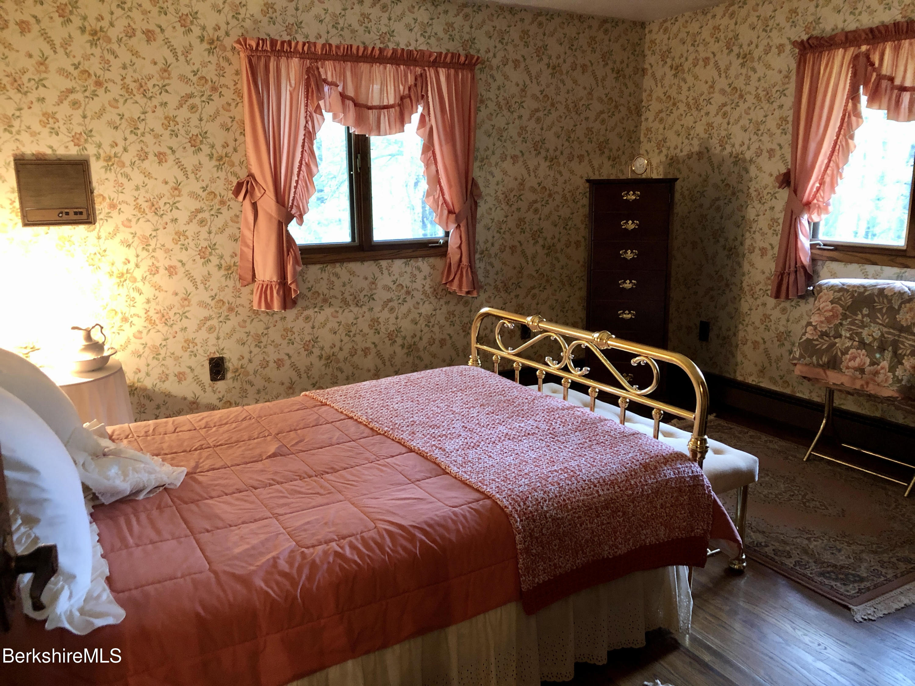 35 Pine Knoll Road Lenox, MA 01240 - Photo 17 of 26 a bedroom with a bed and a window