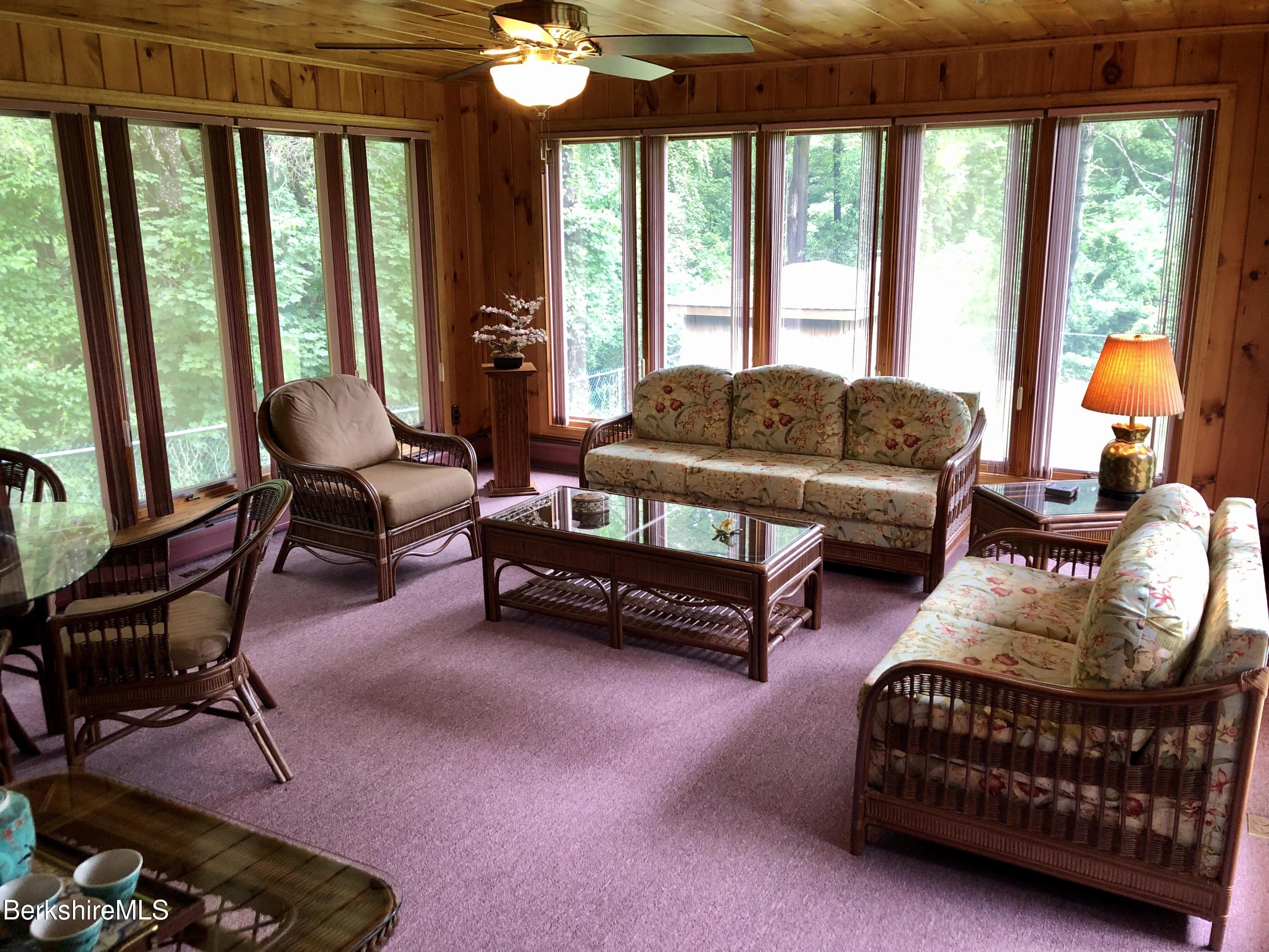35 Pine Knoll Road Lenox, MA 01240 - Photo 9 of 26 a living room with furniture and a large window