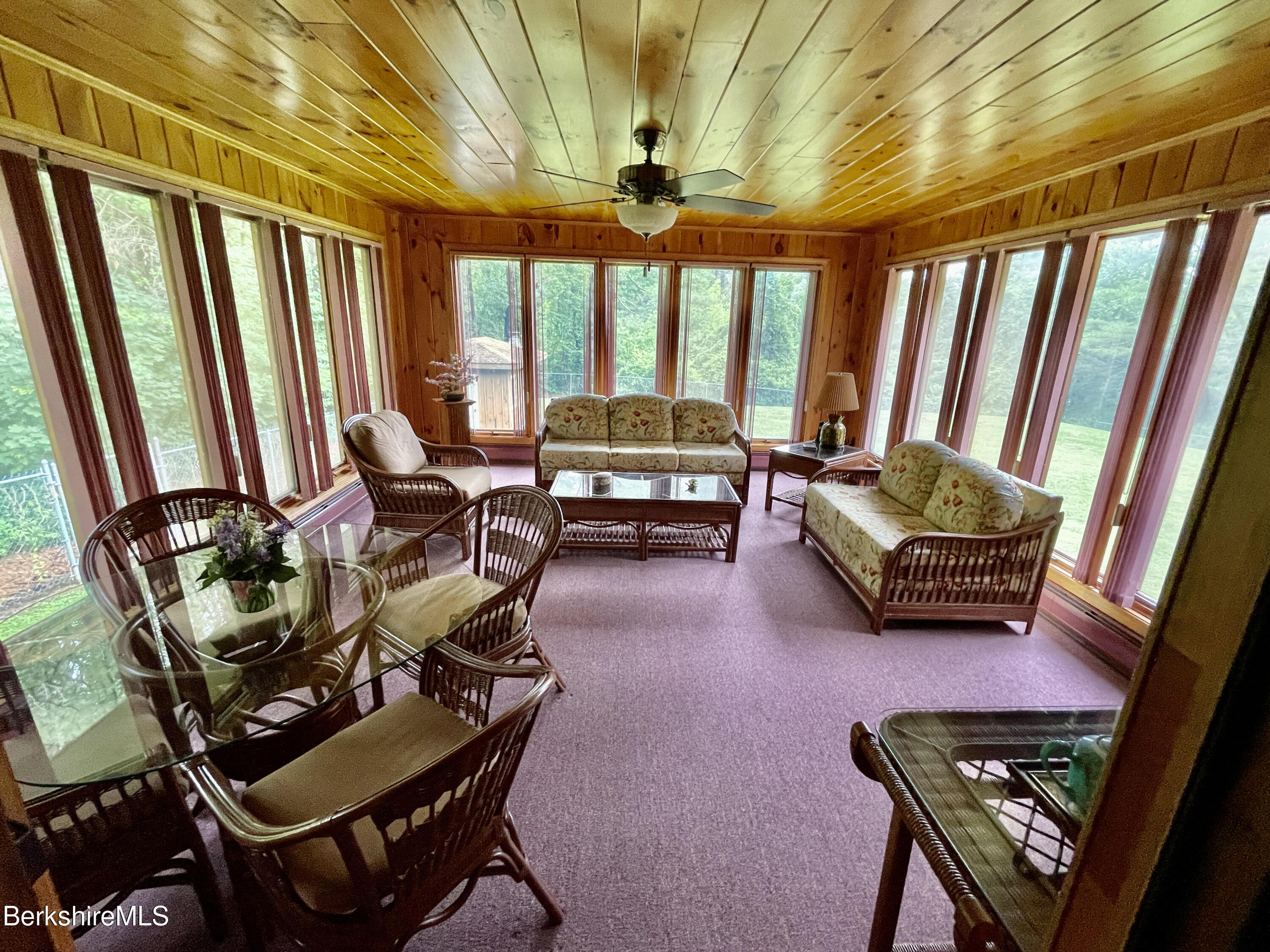 35 Pine Knoll Road Lenox, MA 01240 - Photo 10 of 26 a living room with furniture and a window