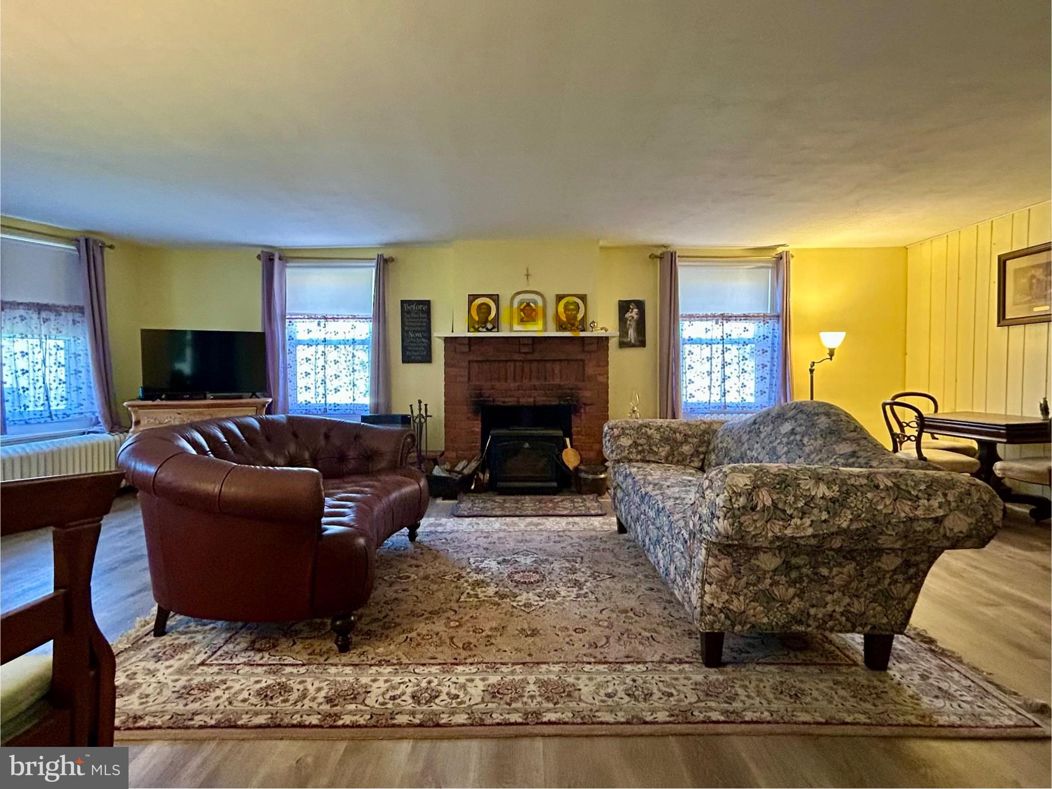 2415 Second Street Pike Newtown, PA 18940 - Photo 5 of 51 a living room with furniture and a fireplace