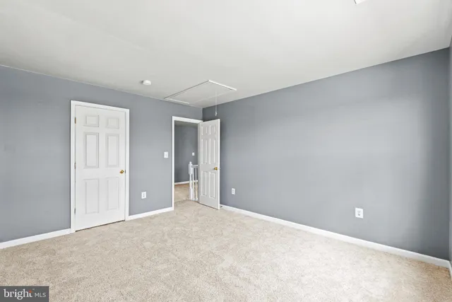 a view of an empty room with window