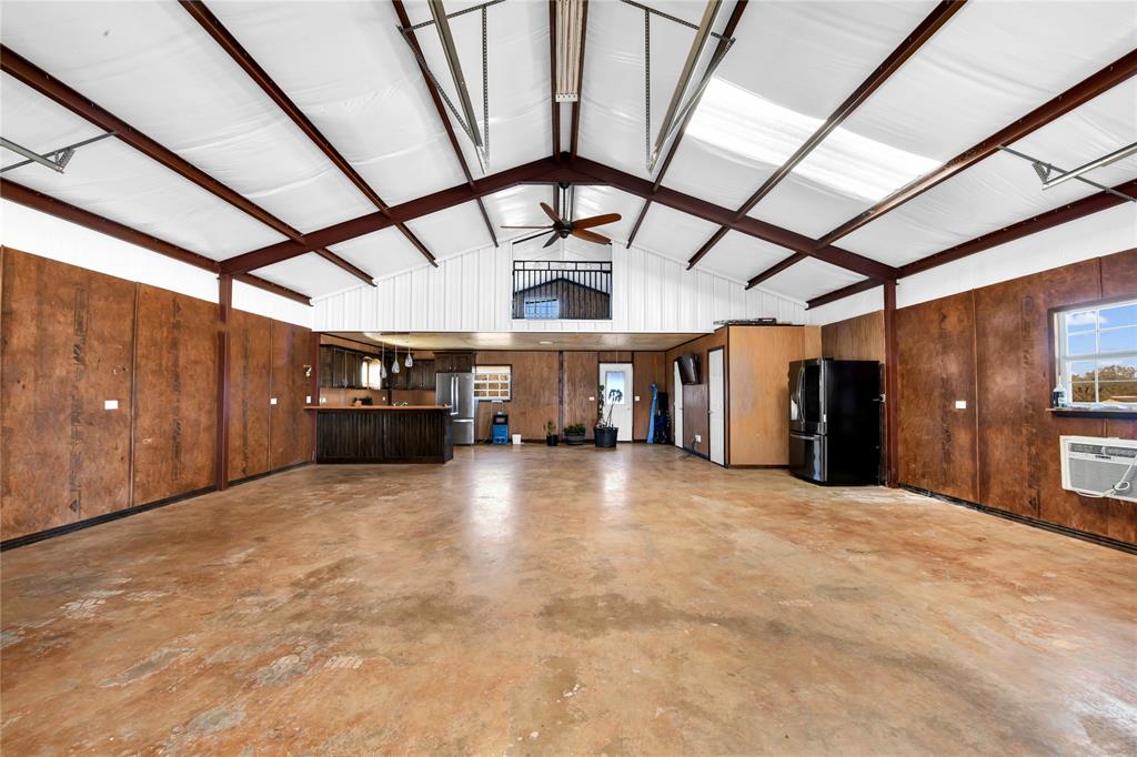 854 County Road 3330 Bridgeport, TX 76426 - Photo 34 of 40 Insulated, stainless electric stove, stained concrete floor
