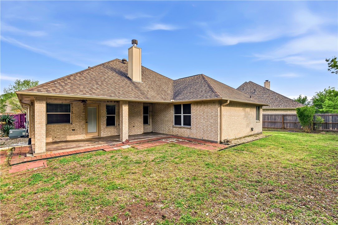 5310 Draycott Court Bryan, TX 77802 - Photo 31 of 31 a view of a house with a yard and large tree