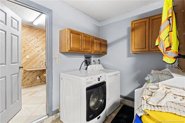 a view of a bedroom with a bed and toys