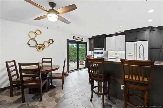 a view of a dining room with furniture