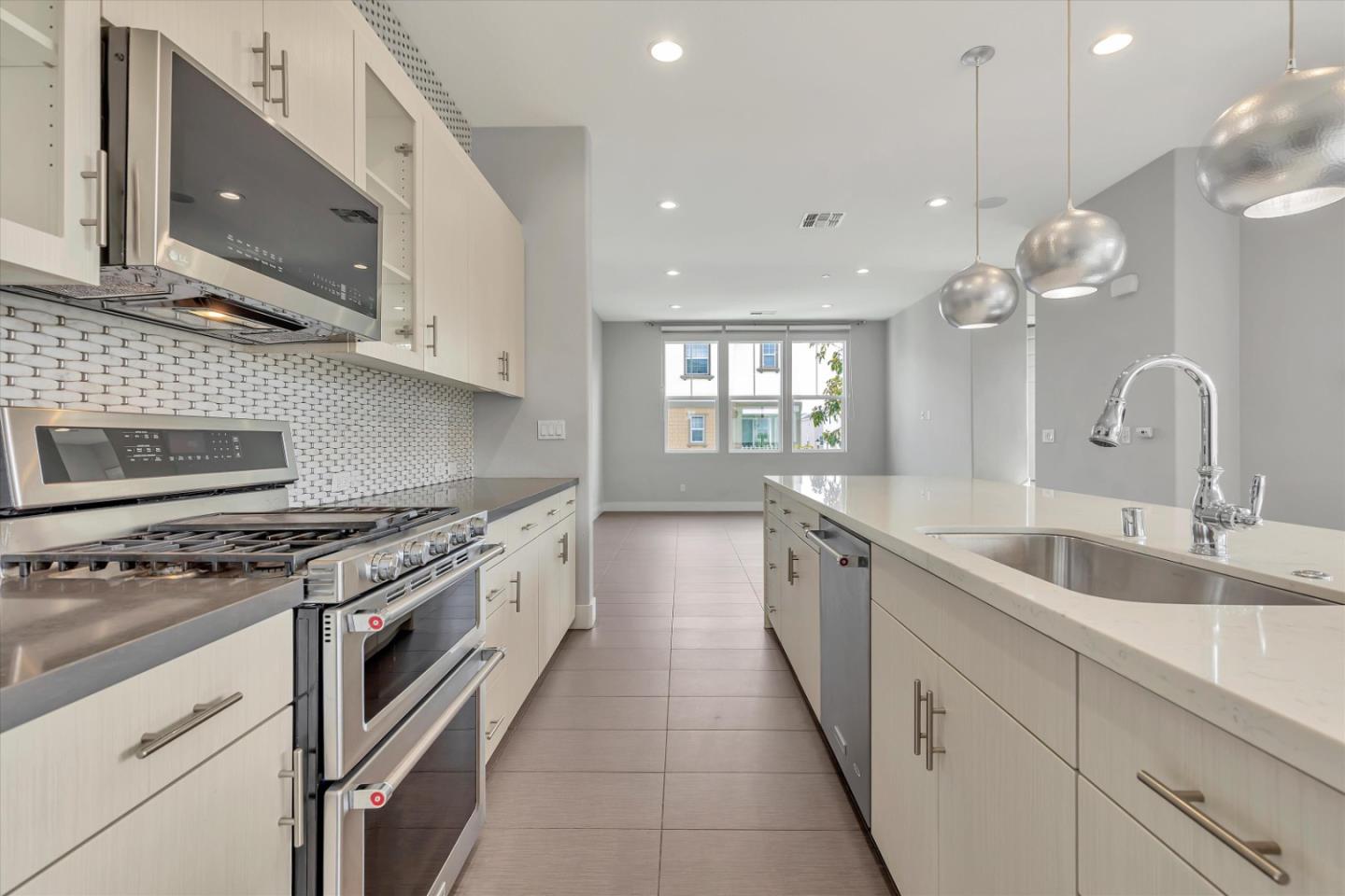 5533 Azalea Way Newark, CA 94560 - Photo 15 of 64 a large kitchen with a stove top oven