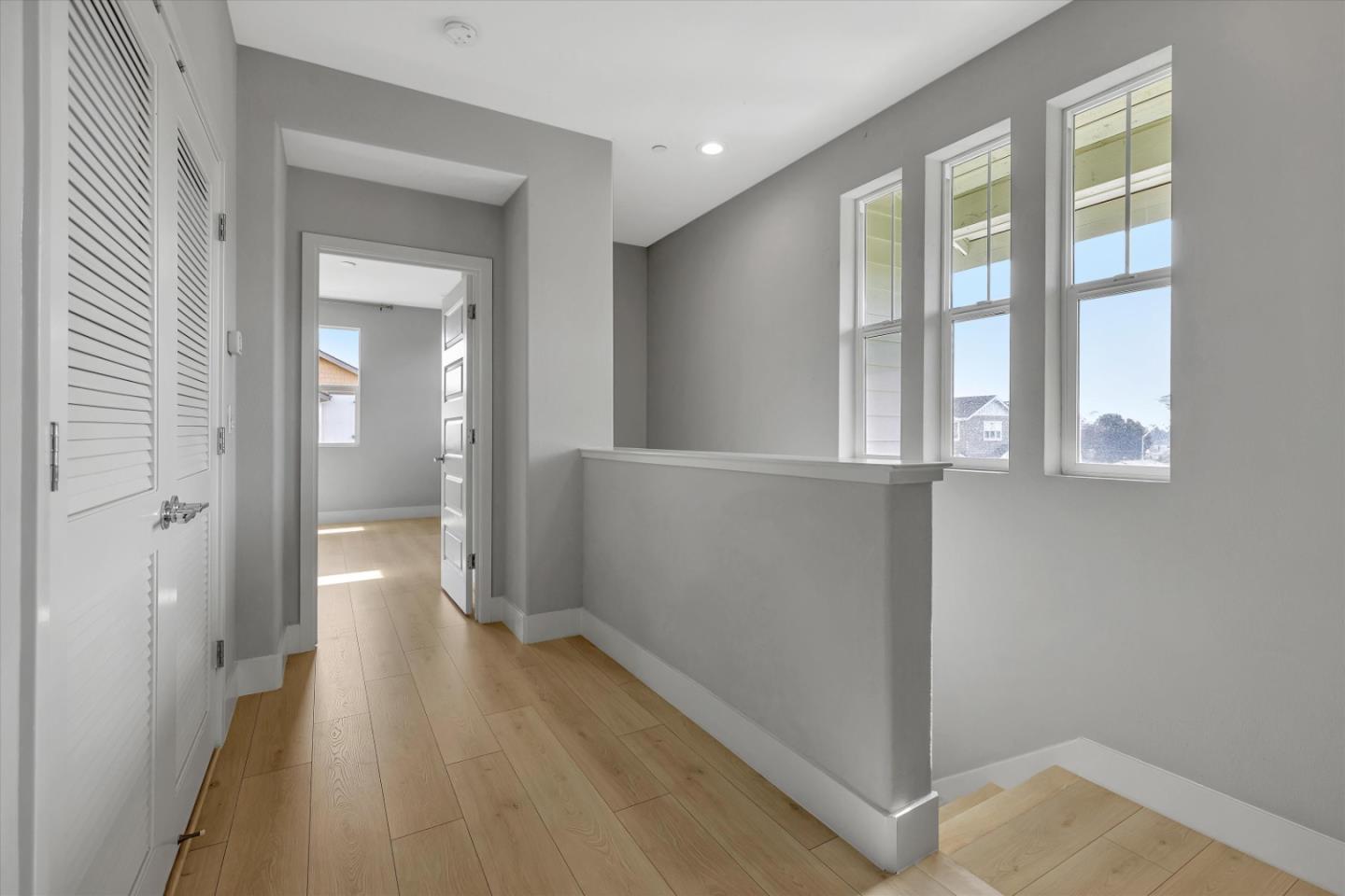 5533 Azalea Way Newark, CA 94560 - Photo 21 of 64 wooden floor and windows in a room