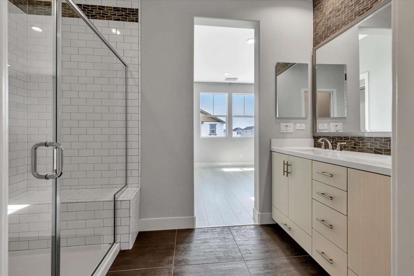 5533 Azalea Way Newark, CA 94560 - Photo 52 of 64 a bathroom with a shower and a sink