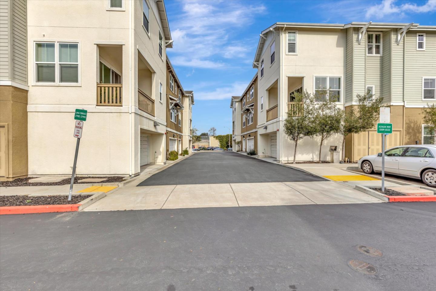 5533 Azalea Way Newark, CA 94560 - Photo 62 of 64 a view of a building with car parked