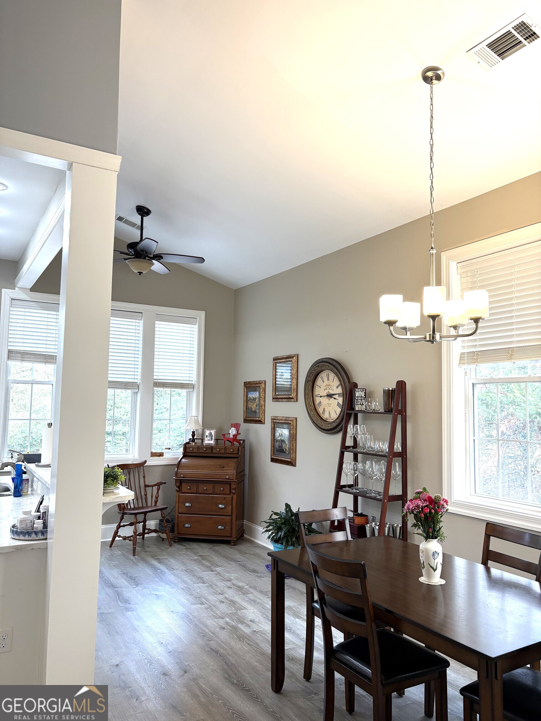 303 Winchester Court Dublin, GA 31021 - Photo 13 of 40 a living room with furniture and a large window