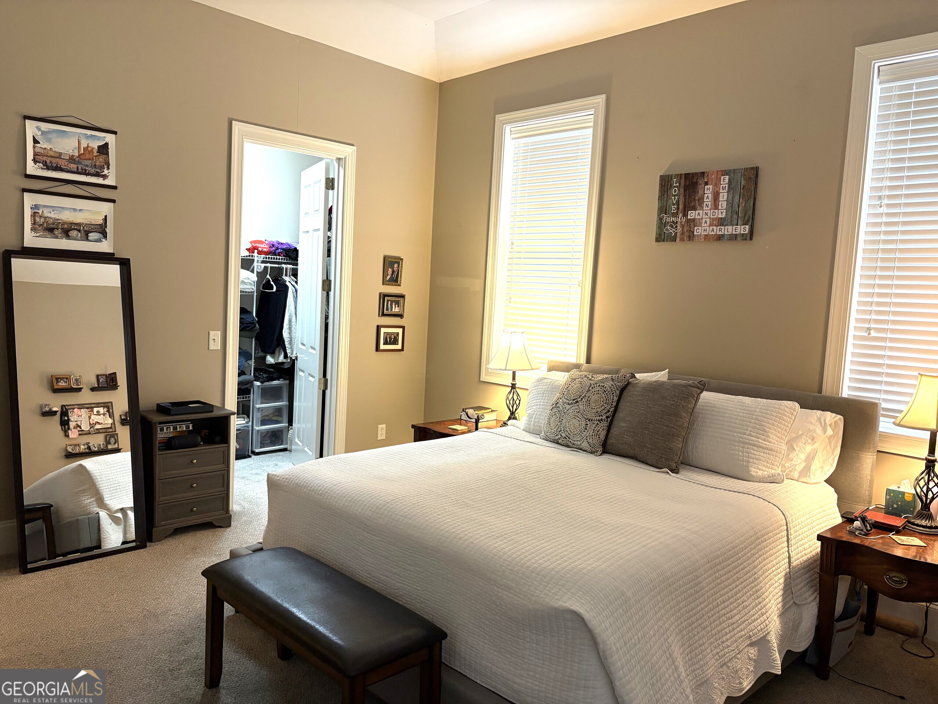 303 Winchester Court Dublin, GA 31021 - Photo 15 of 40 a bedroom with a bed and wooden floor