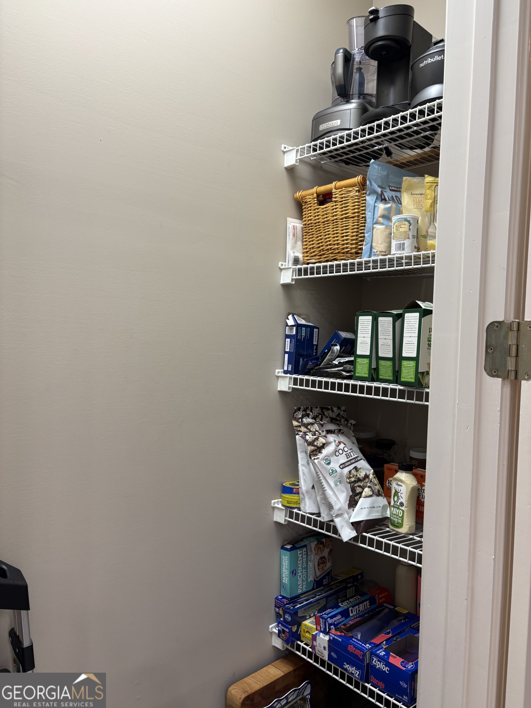 303 Winchester Court Dublin, GA 31021 - Photo 28 of 40 a room with storage and utility