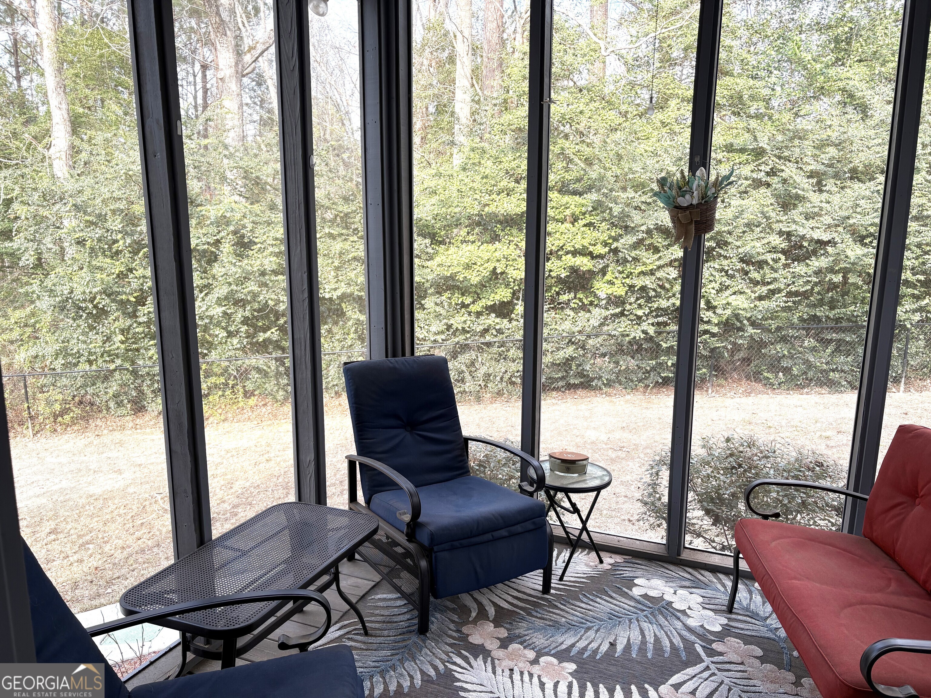 303 Winchester Court Dublin, GA 31021 - Photo 29 of 40 a living room with furniture and a window