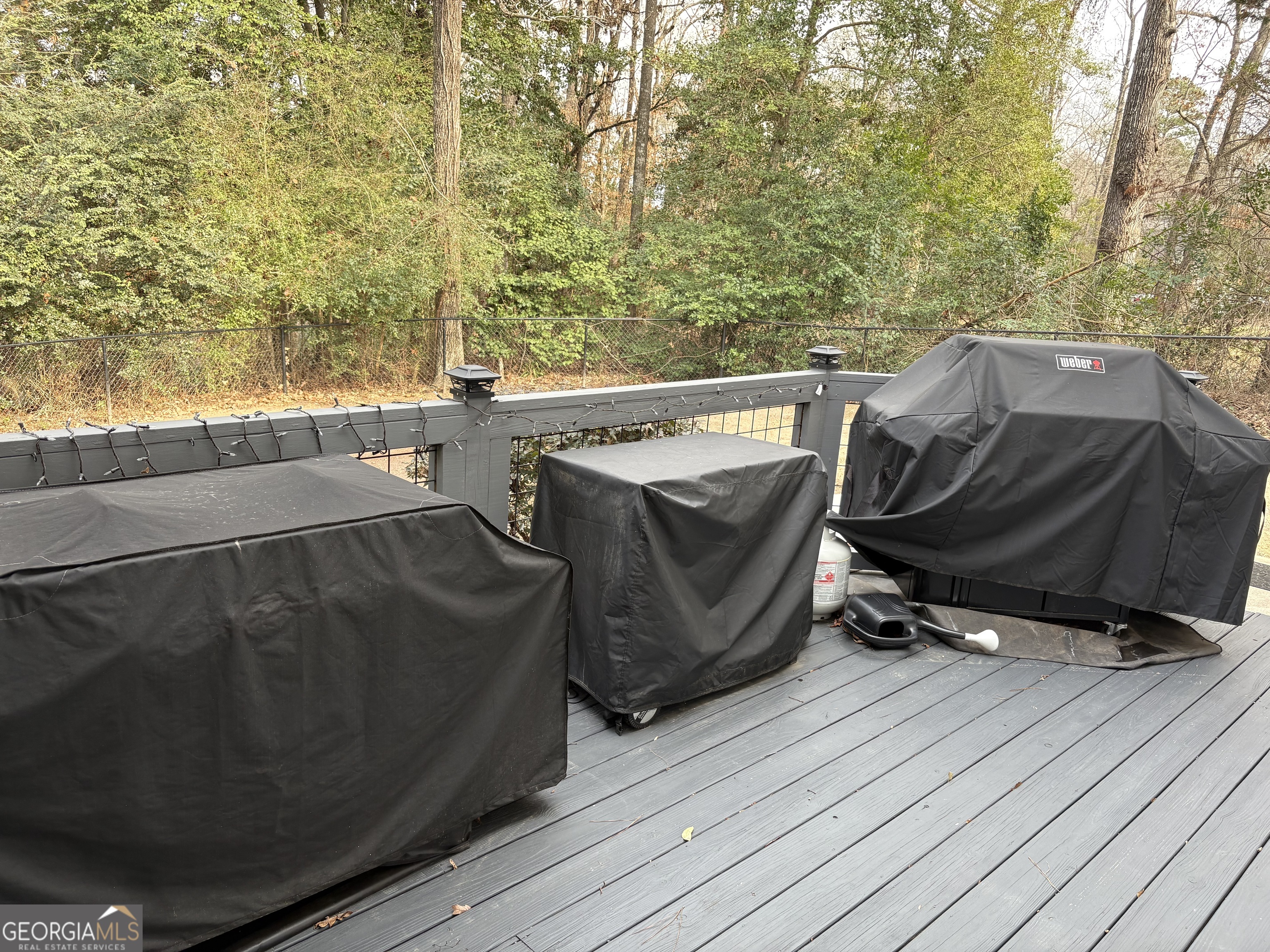 303 Winchester Court Dublin, GA 31021 - Photo 30 of 40 a view of a balcony with chairs