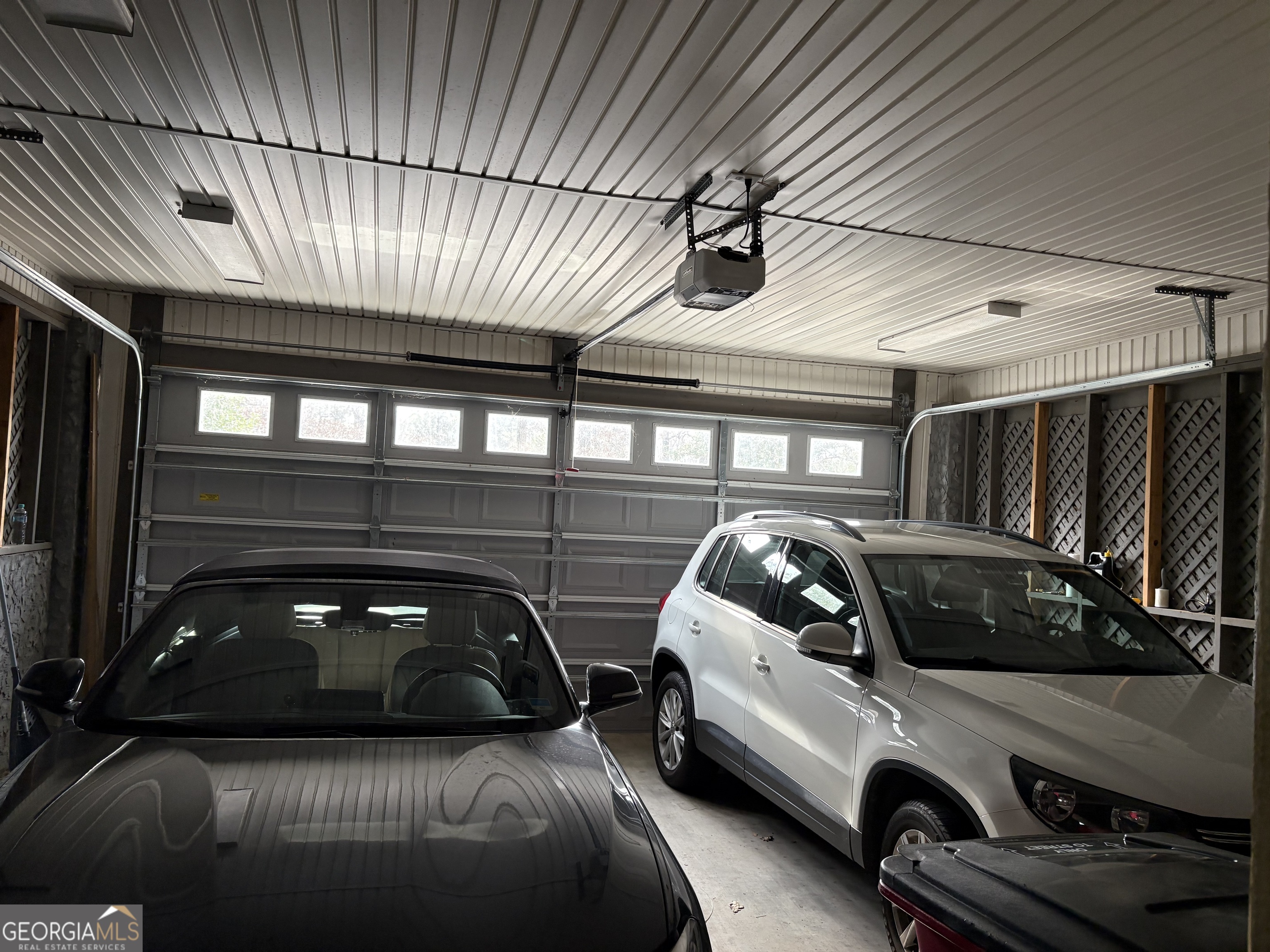303 Winchester Court Dublin, GA 31021 - Photo 37 of 40 a car parked in a parking garage
