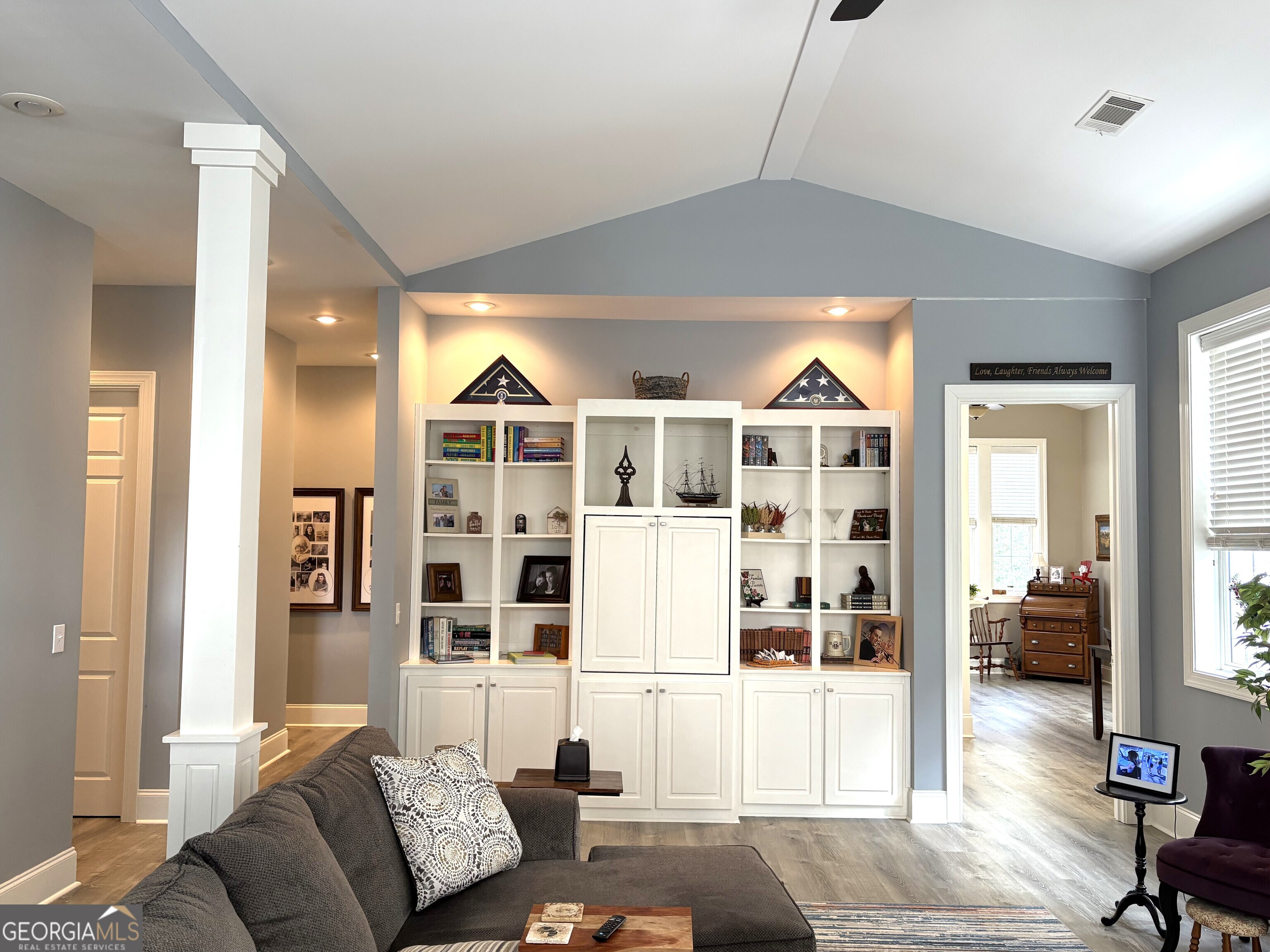 303 Winchester Court Dublin, GA 31021 - Photo 7 of 40 a living room with furniture and a large window