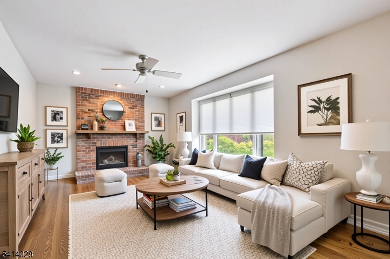 193 Parker Road Long Valley, NJ 07853 - Photo 2 of 13 a living room with furniture and a fireplace