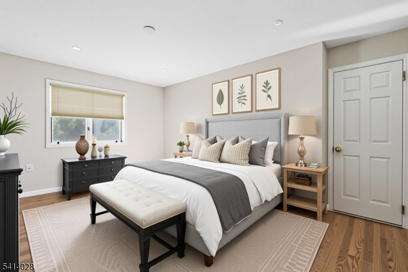 193 Parker Road Long Valley, NJ 07853 - Photo 3 of 13 a bedroom with a bed and a table