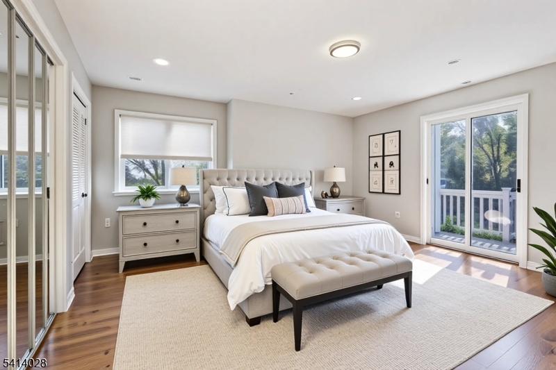 193 Parker Road Long Valley, NJ 07853 - Photo 7 of 13 a spacious bedroom with a bed and a large window